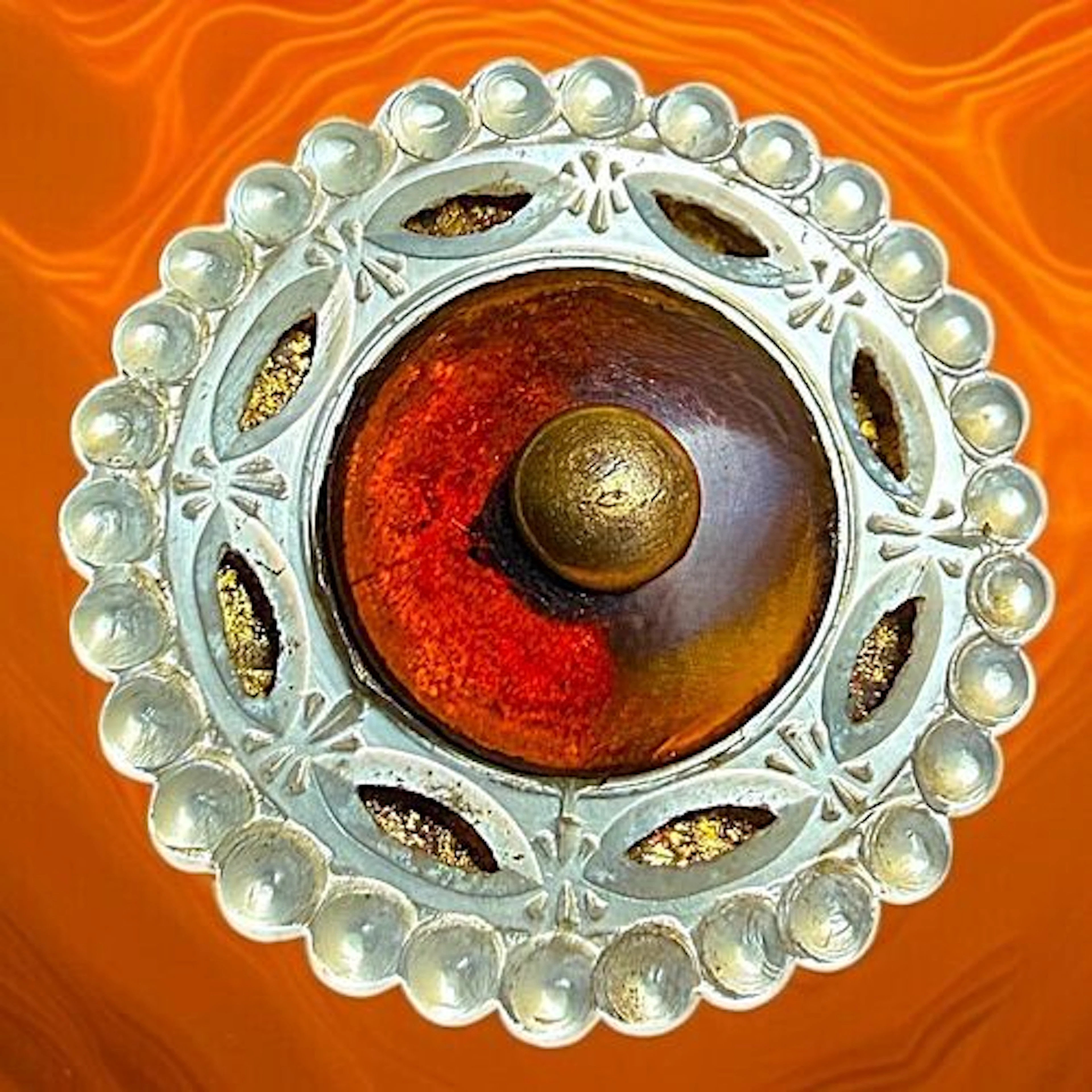 A DIVISON ONE PEARL-TORTOISE AND GOLD BUTTON