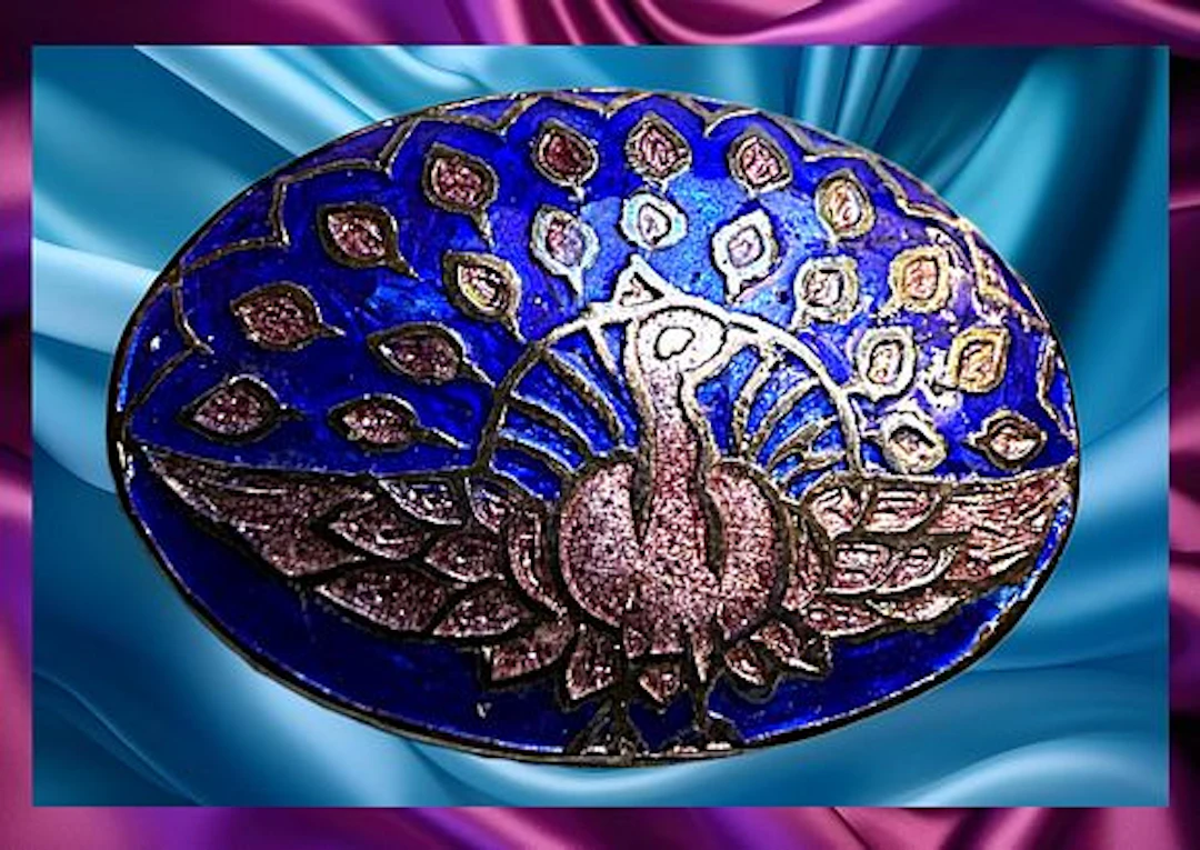 A DIVISION ONE COLORFUL ENAMEL BIRD BUTTON.