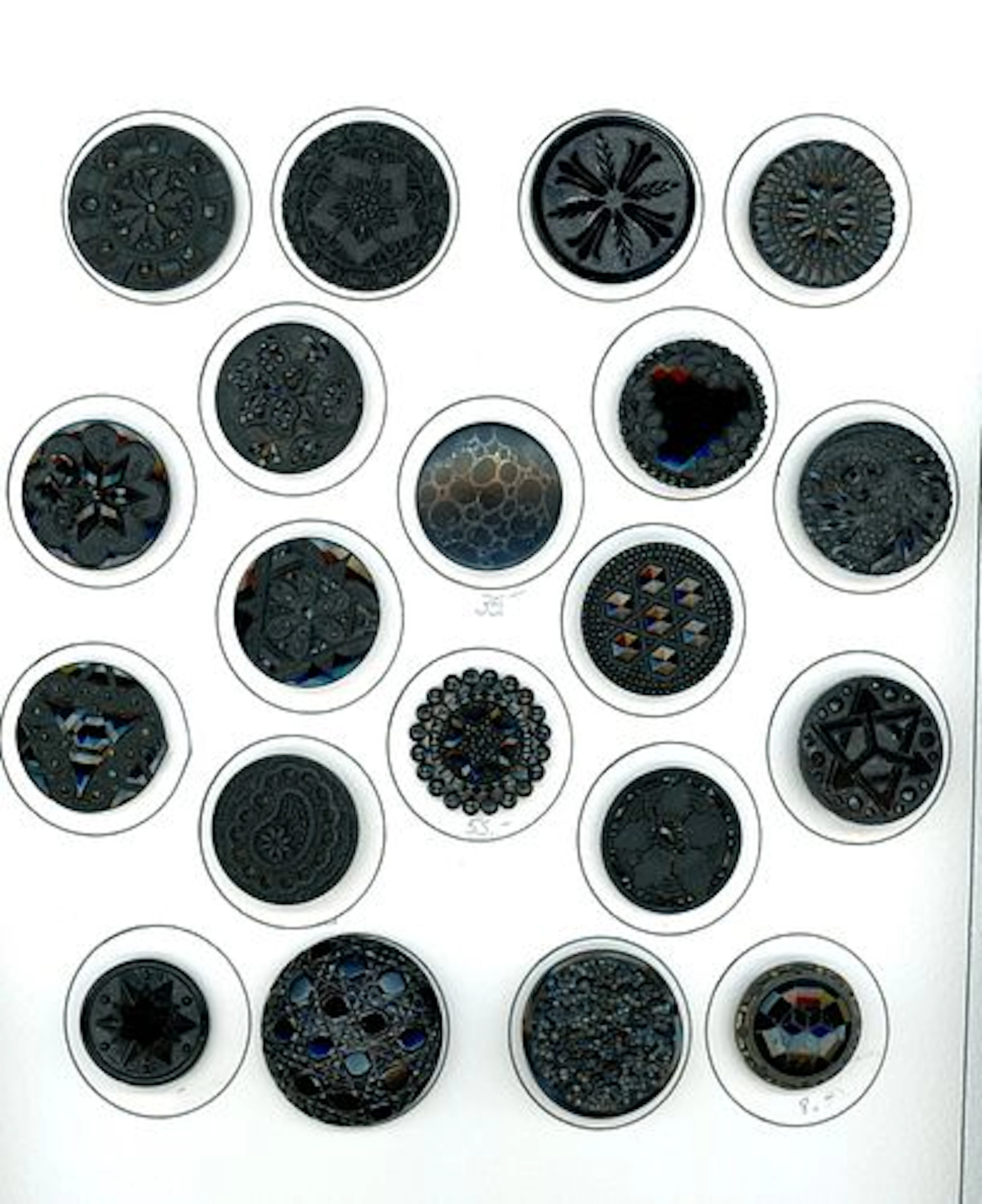 A CARD OF DIVISION ONE BLACK GLASS BUTTONS