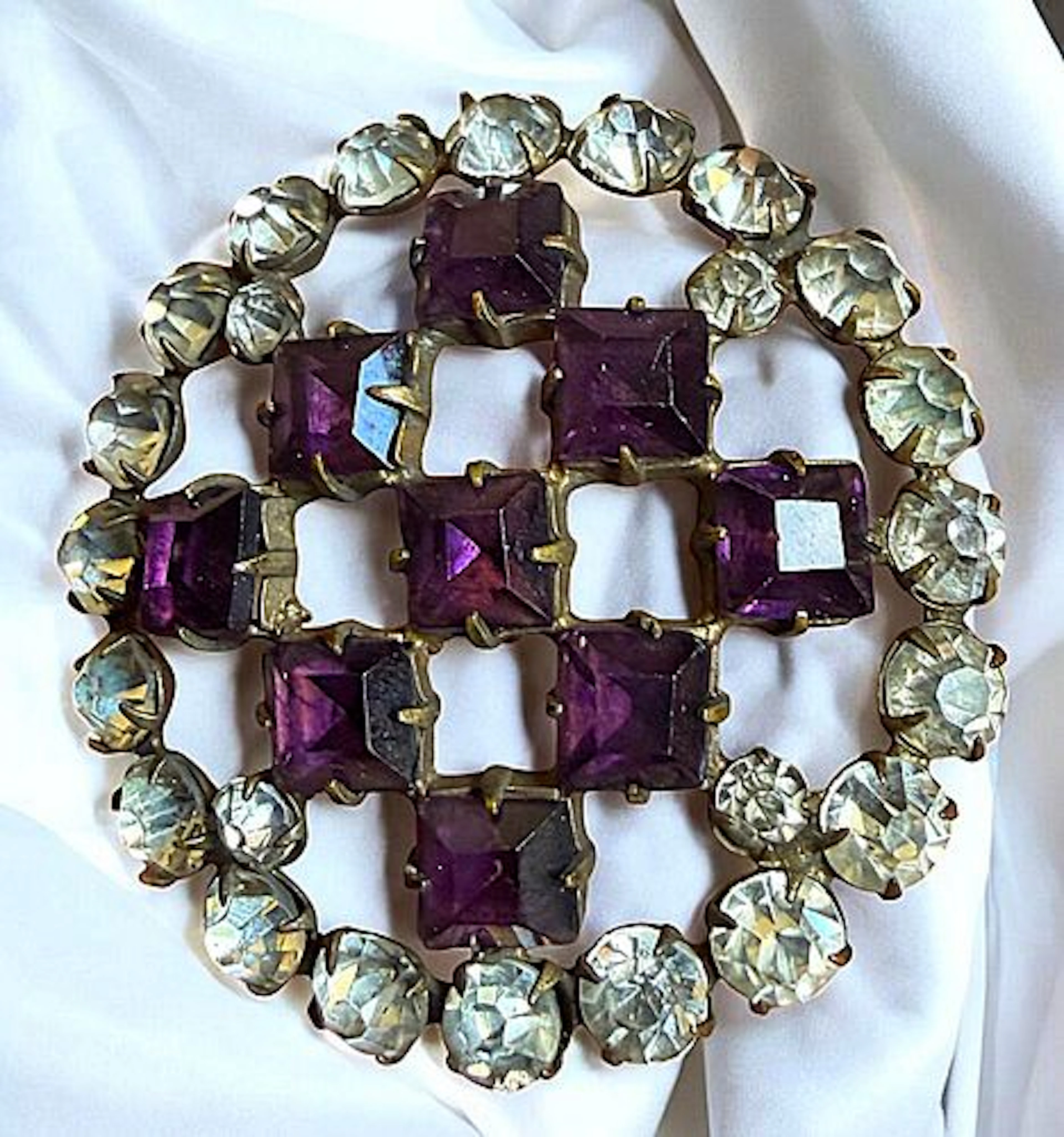 A DIVISION ONE PIERCED SPARKLING JEWELED BUTTON