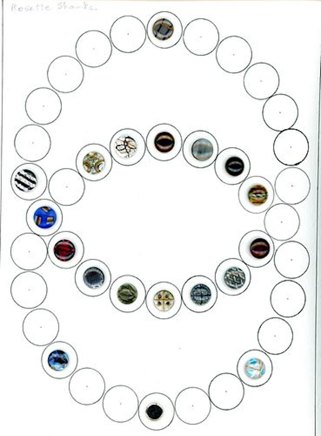 A PARTIAL CARD OF DIVISION ONE GLASS BUTTONS