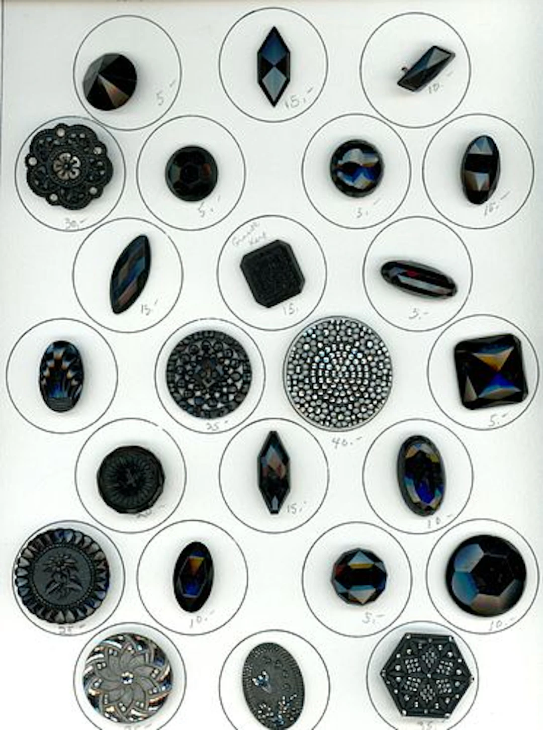A CARD OF DIVISION ONE BLACK GLASS BUTTONS