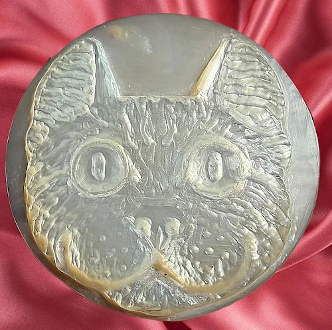 A DIVISION THREE STUDIO ARTIST BUTTON