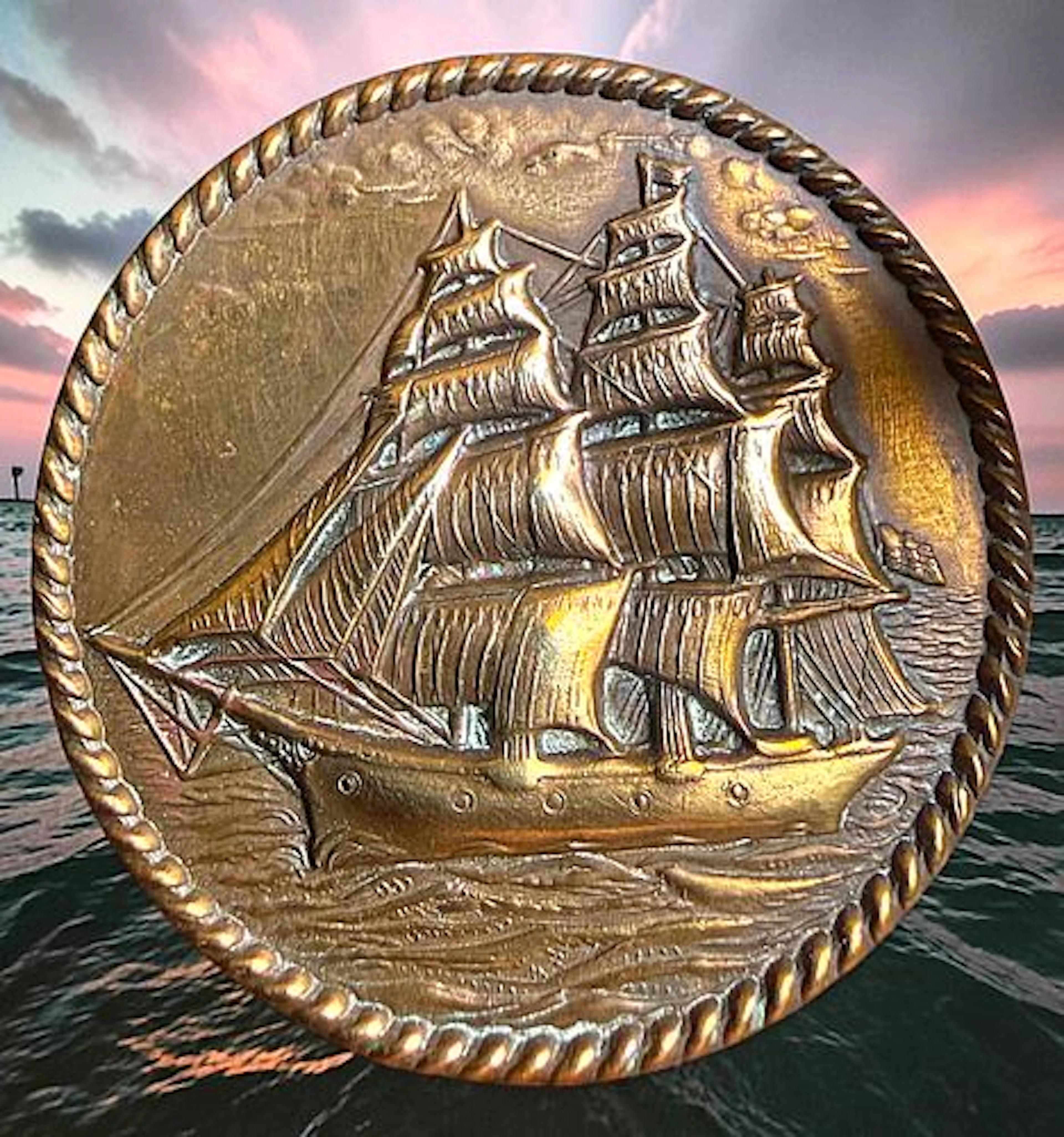 A DIVISION ONE BRASS PICTORIAL BUTTON