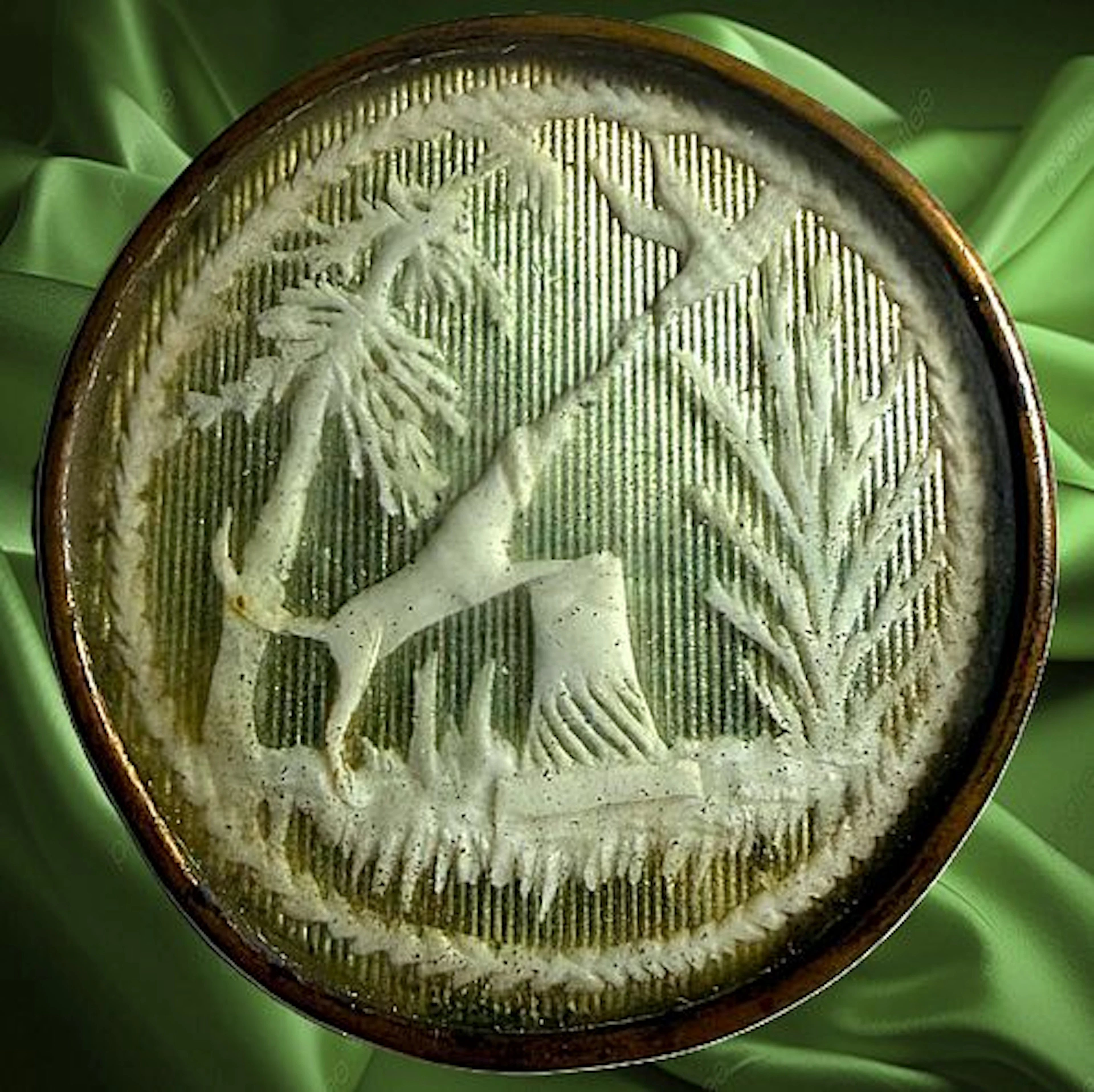 A RARE DIVISION ONE UNDER GLASS ANIMAL BUTTON