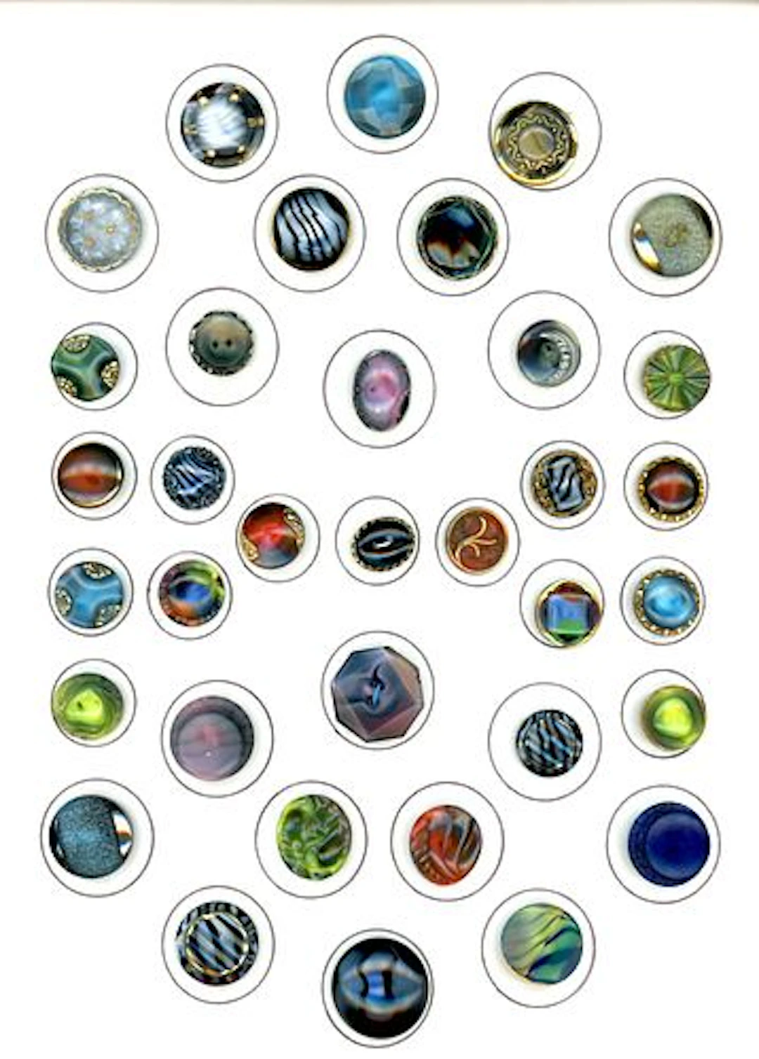 A CARD OF DIVISION THREE COLORFUL BLACK GLASS BUTTONS
