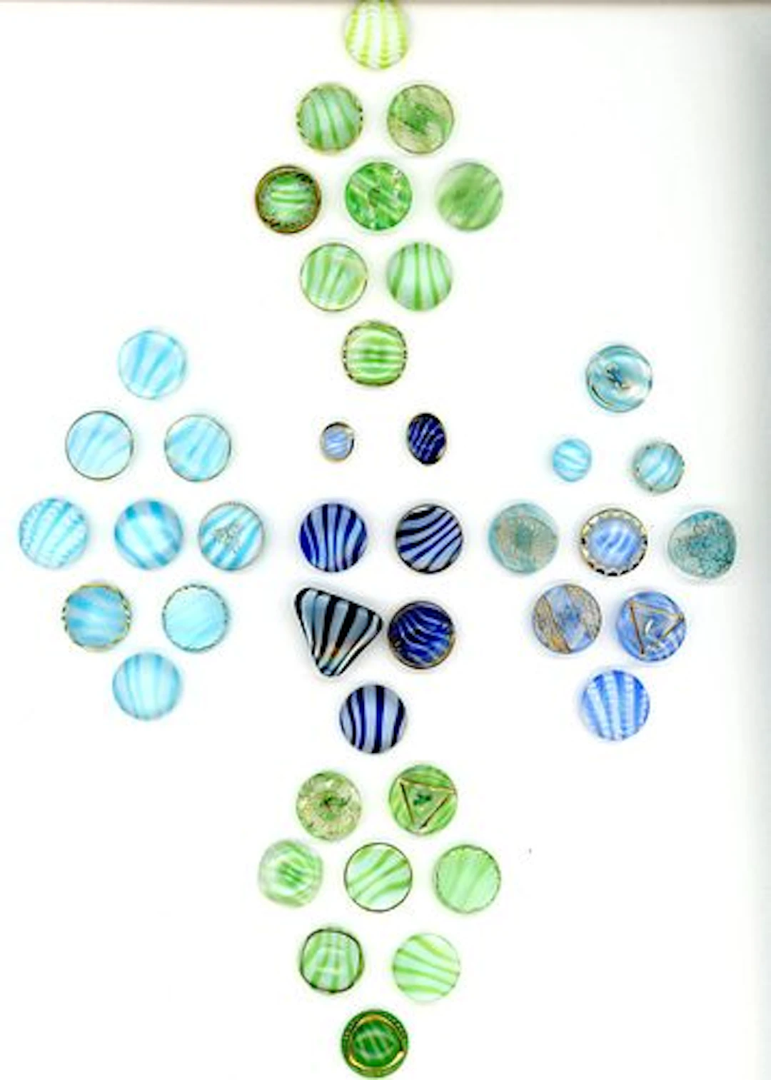 A CARD OF DIVISION THREE MOONGLOW GLASS BUTTONS