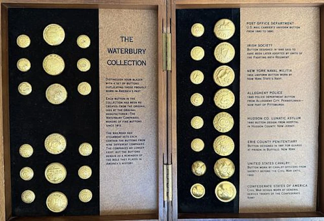 A DIVISION THREE COMPLETE BOXED SET OF BUTTONS