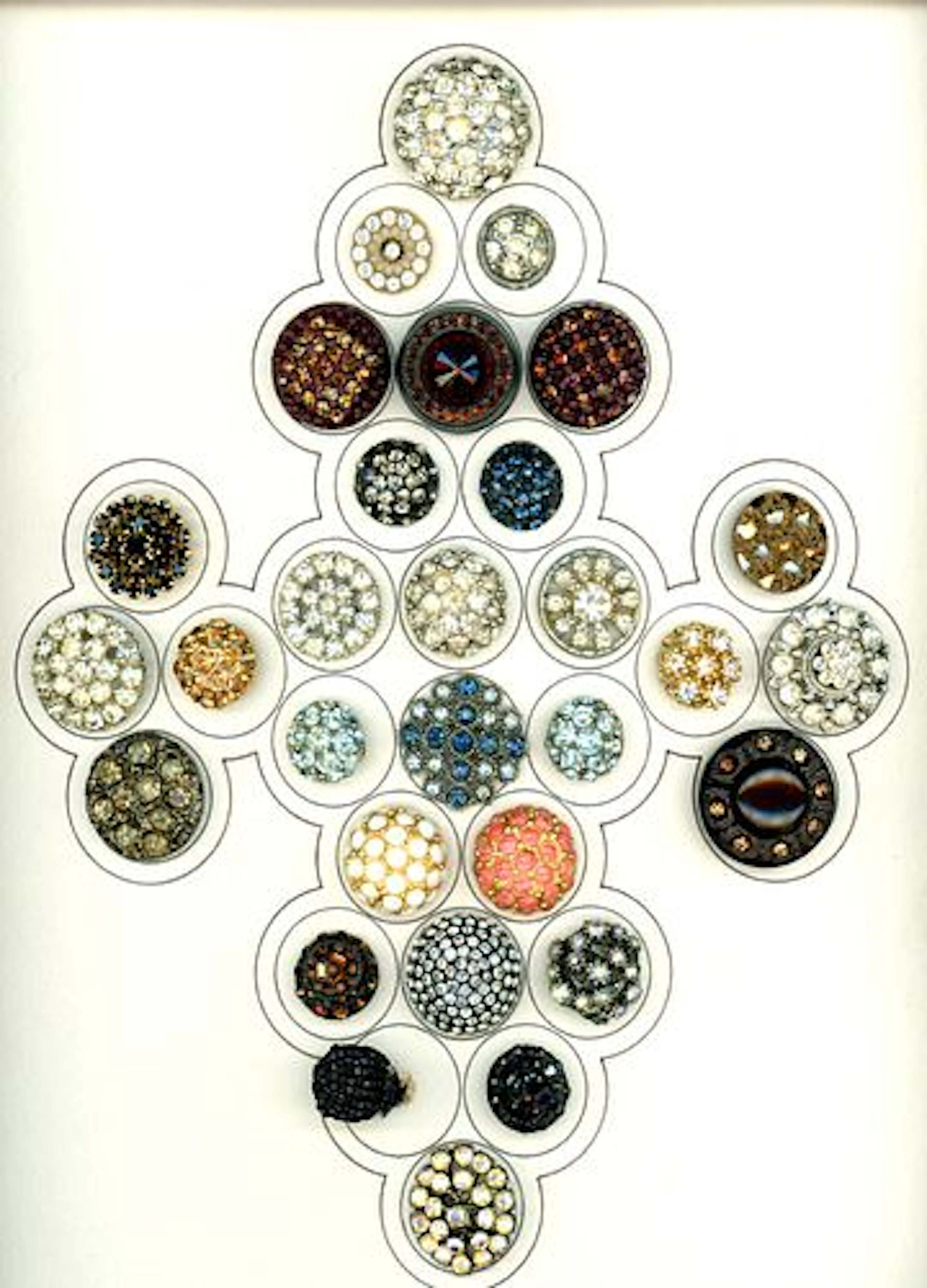 A CARD OF DIVISION ONE AND THREE JEWELED BUTTONS