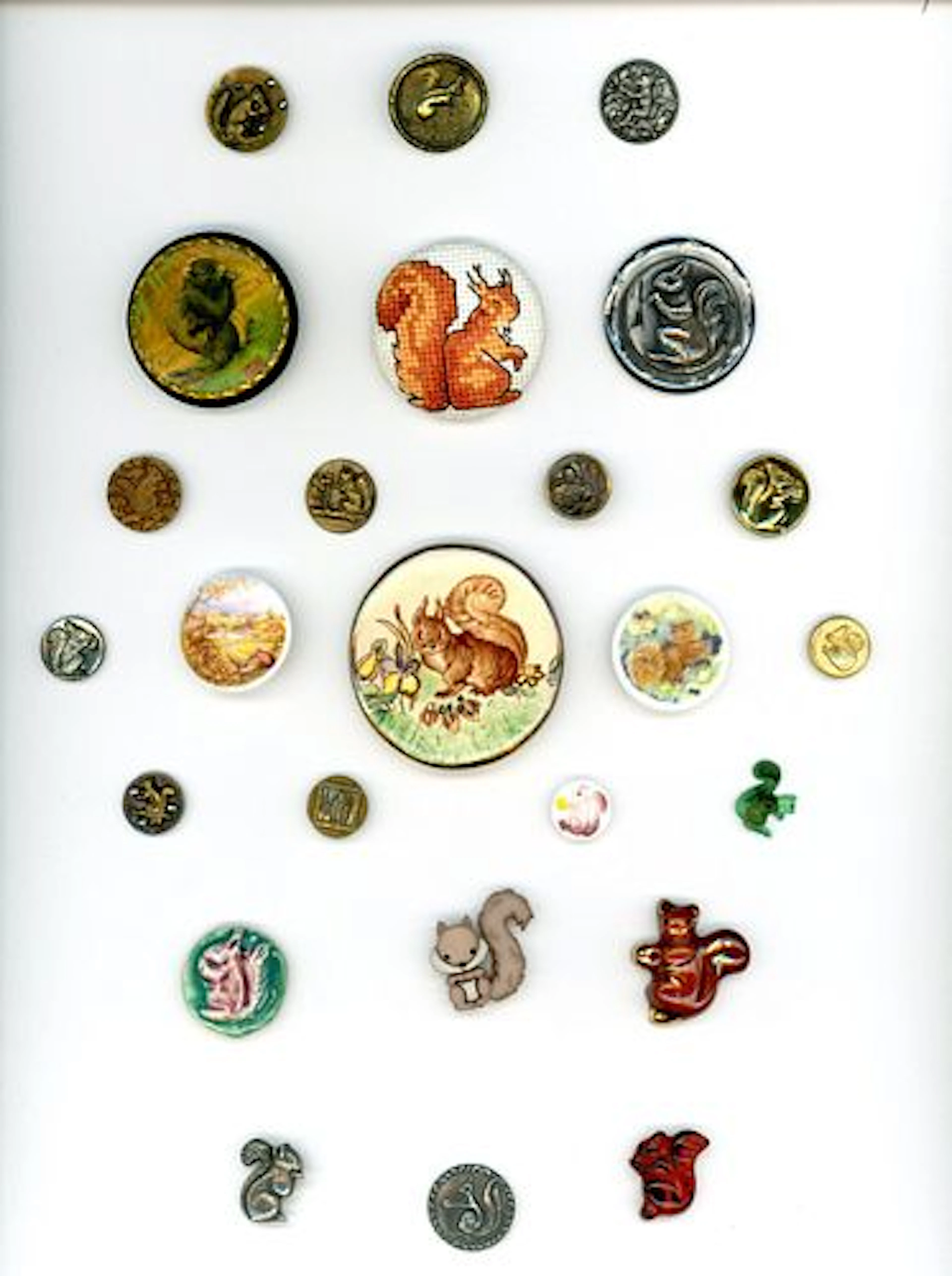 A CARD OF DIVISION ONE AND THREE SQUIRREL BUTTONS