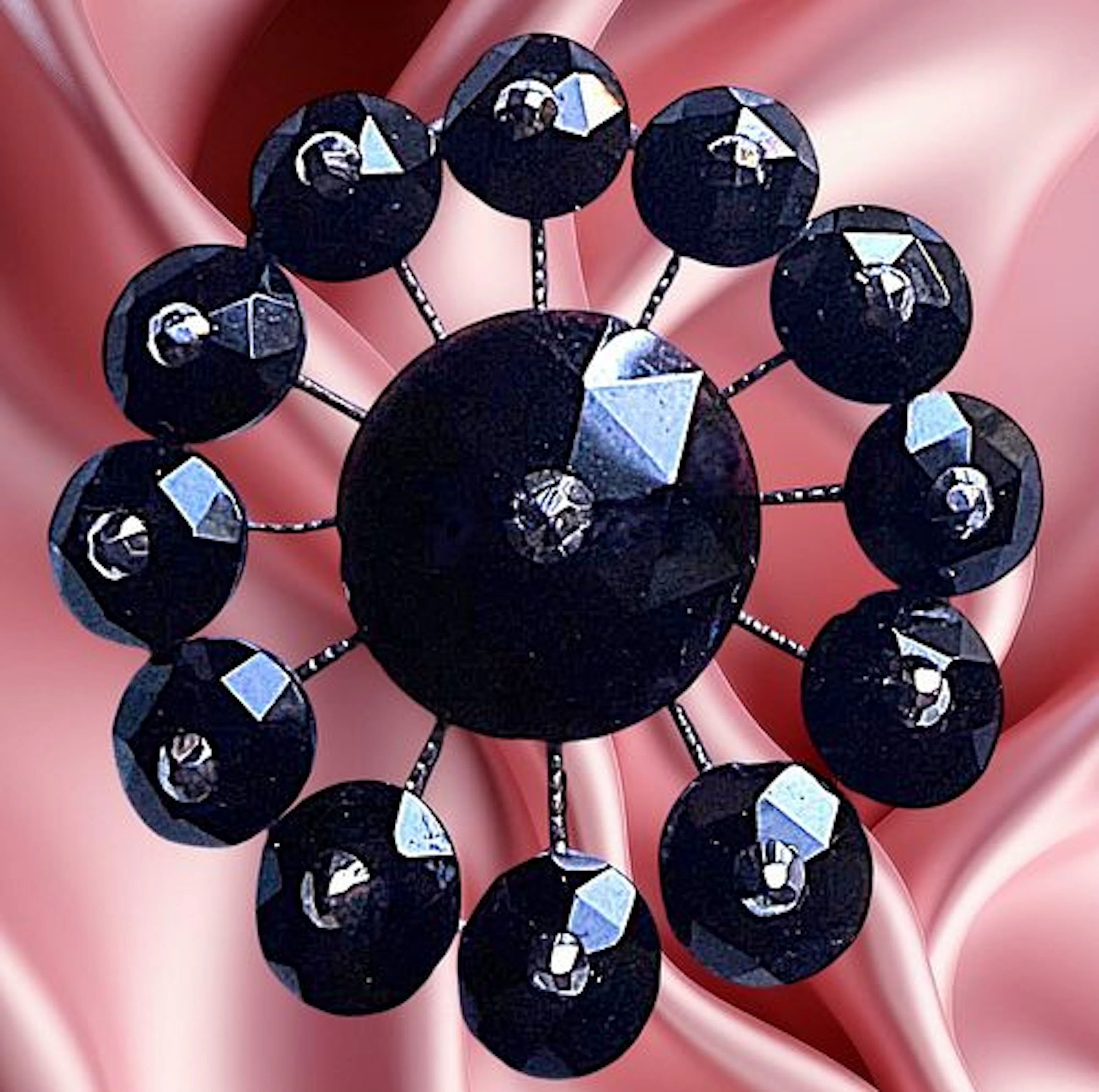 A DIVISION ONE PIERCED RIVETED BLACK GLASS BUTTON