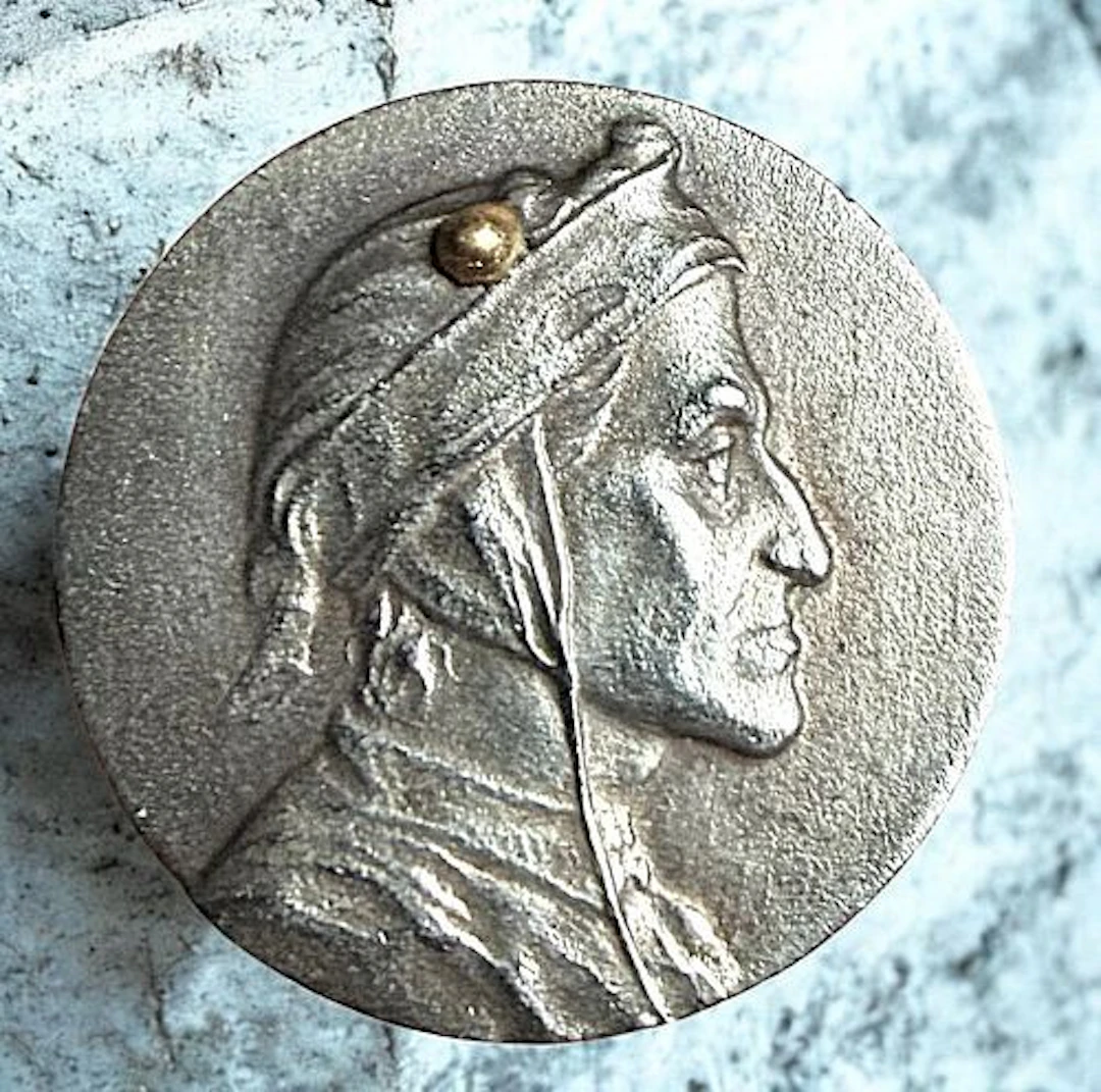 A DIVISION ONE THIRD AVENUE SILVER BUTTON