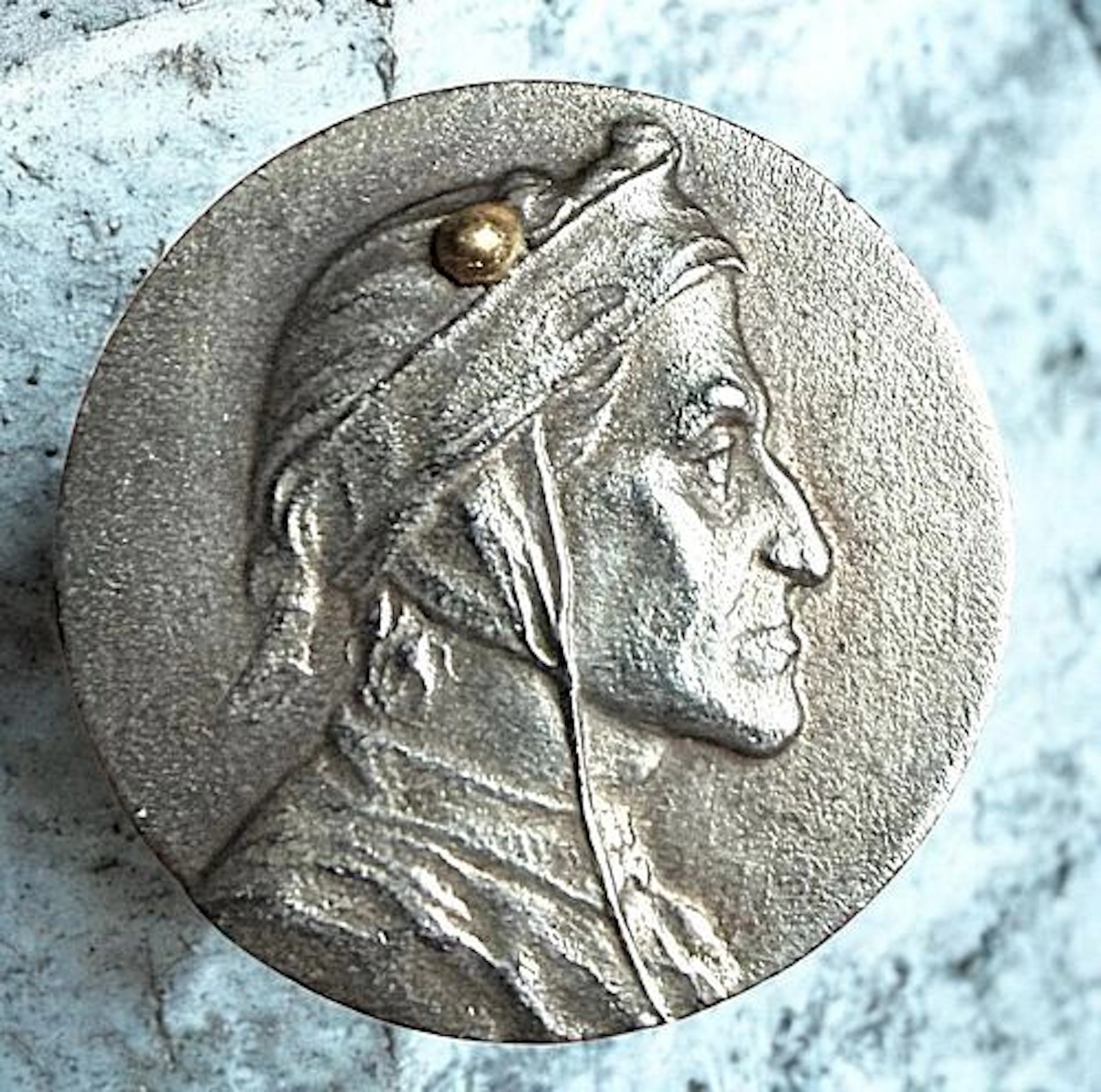 A DIVISION ONE THIRD AVENUE SILVER BUTTON