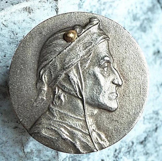 A DIVISION ONE THIRD AVENUE SILVER BUTTON