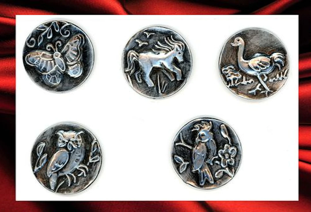 A SMALL CARD OF DIVISION THREE PICTORIAL BUTTONS