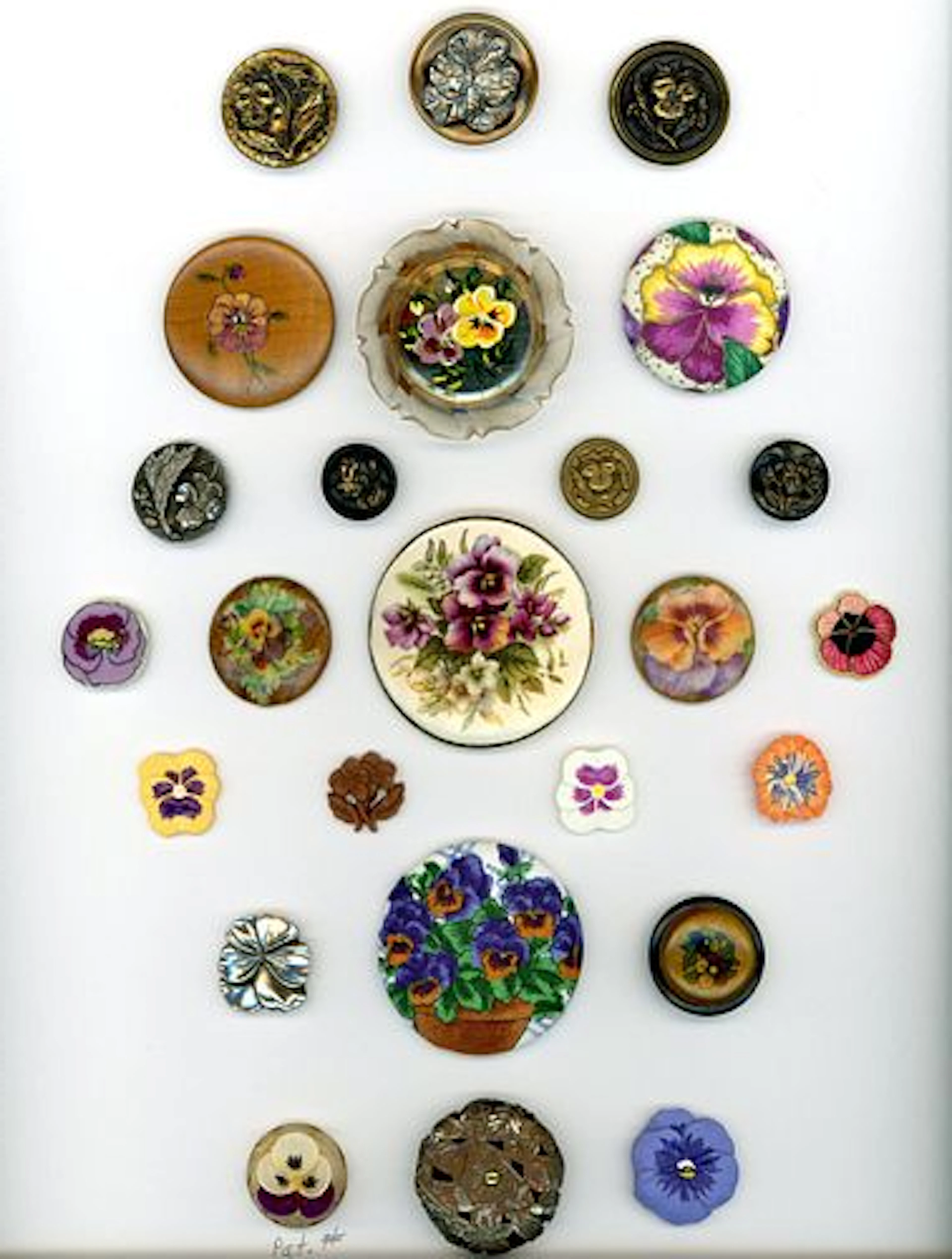 A CARD OF DIVISION ONE AND THREE FLORAL BUTTONS