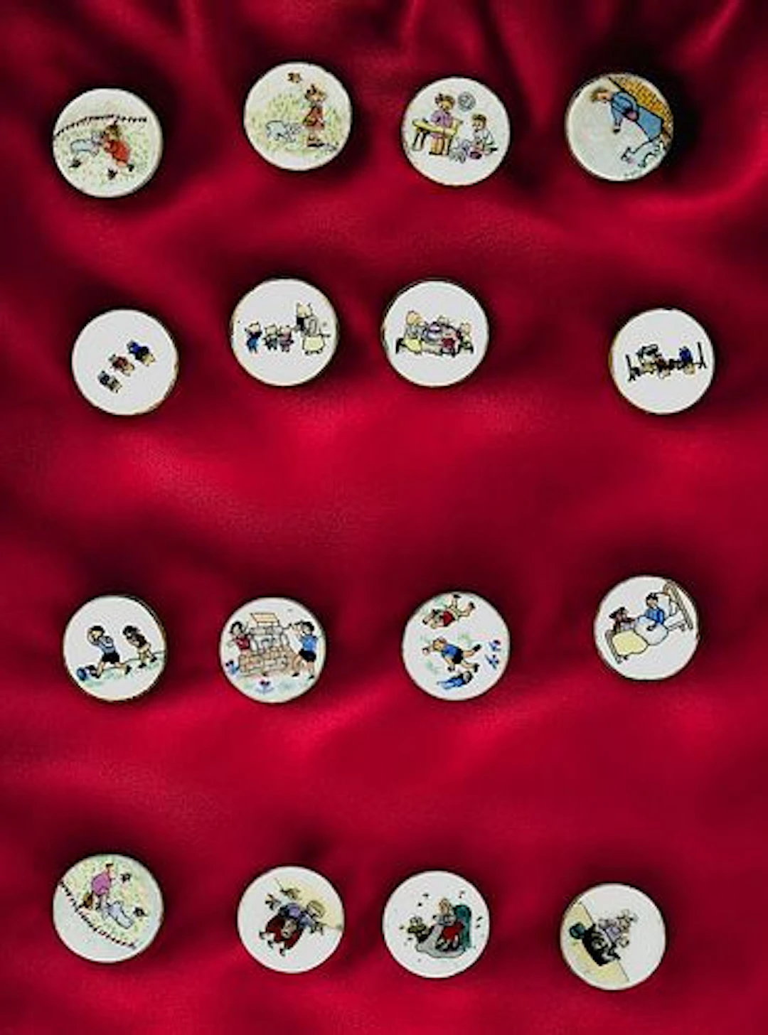 A CARD OF DIVISION THREE STUDIO BUTTONS