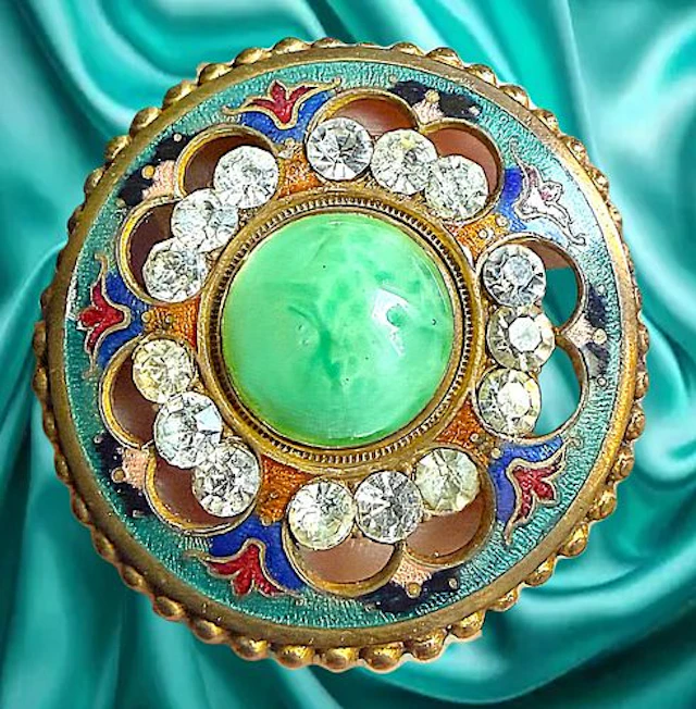 A DIVISION ONE GLASS IN METAL BUTTON