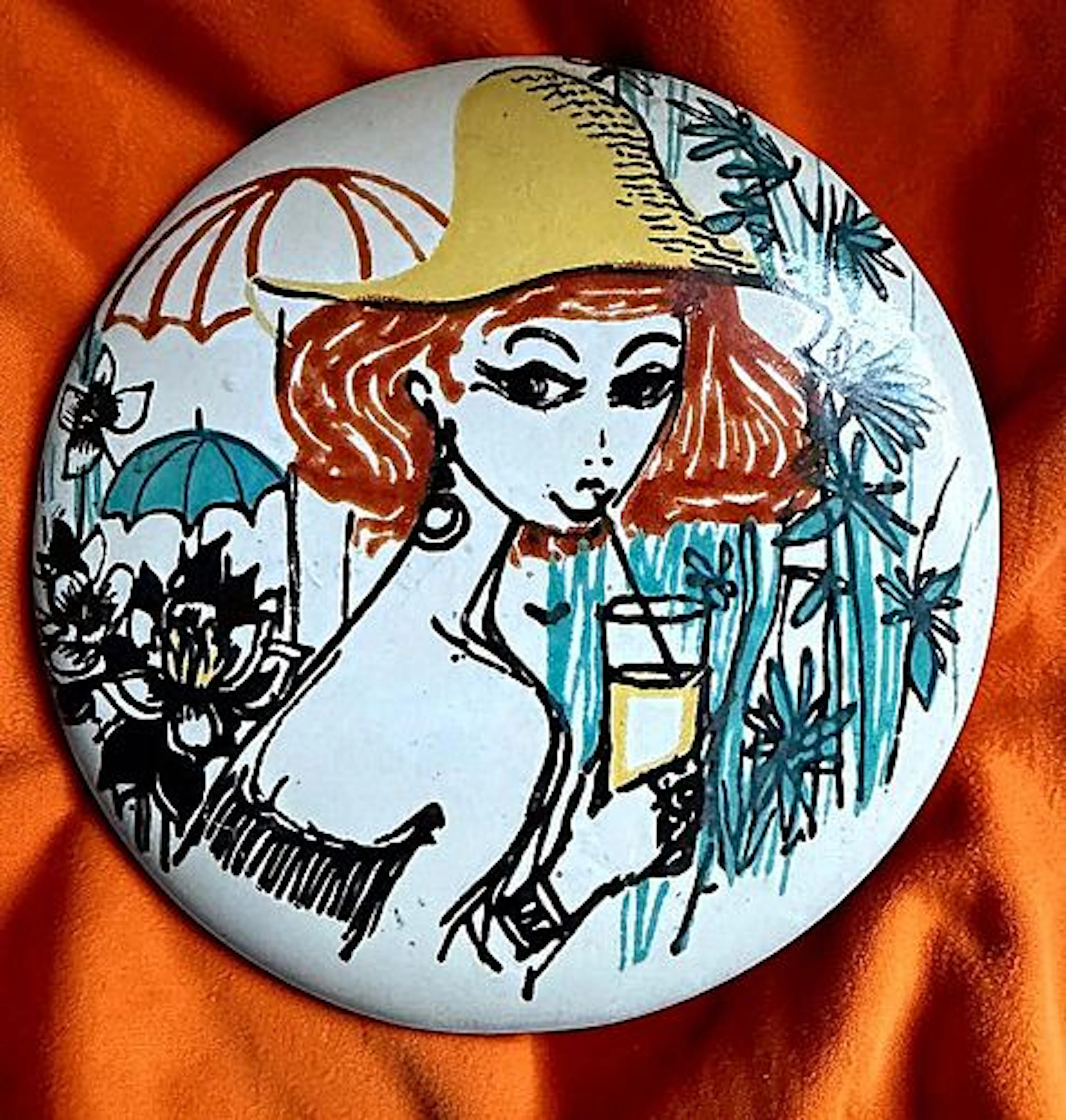 A DIVISION THREE PICTORIAL BUTTON WITH A FEMALE