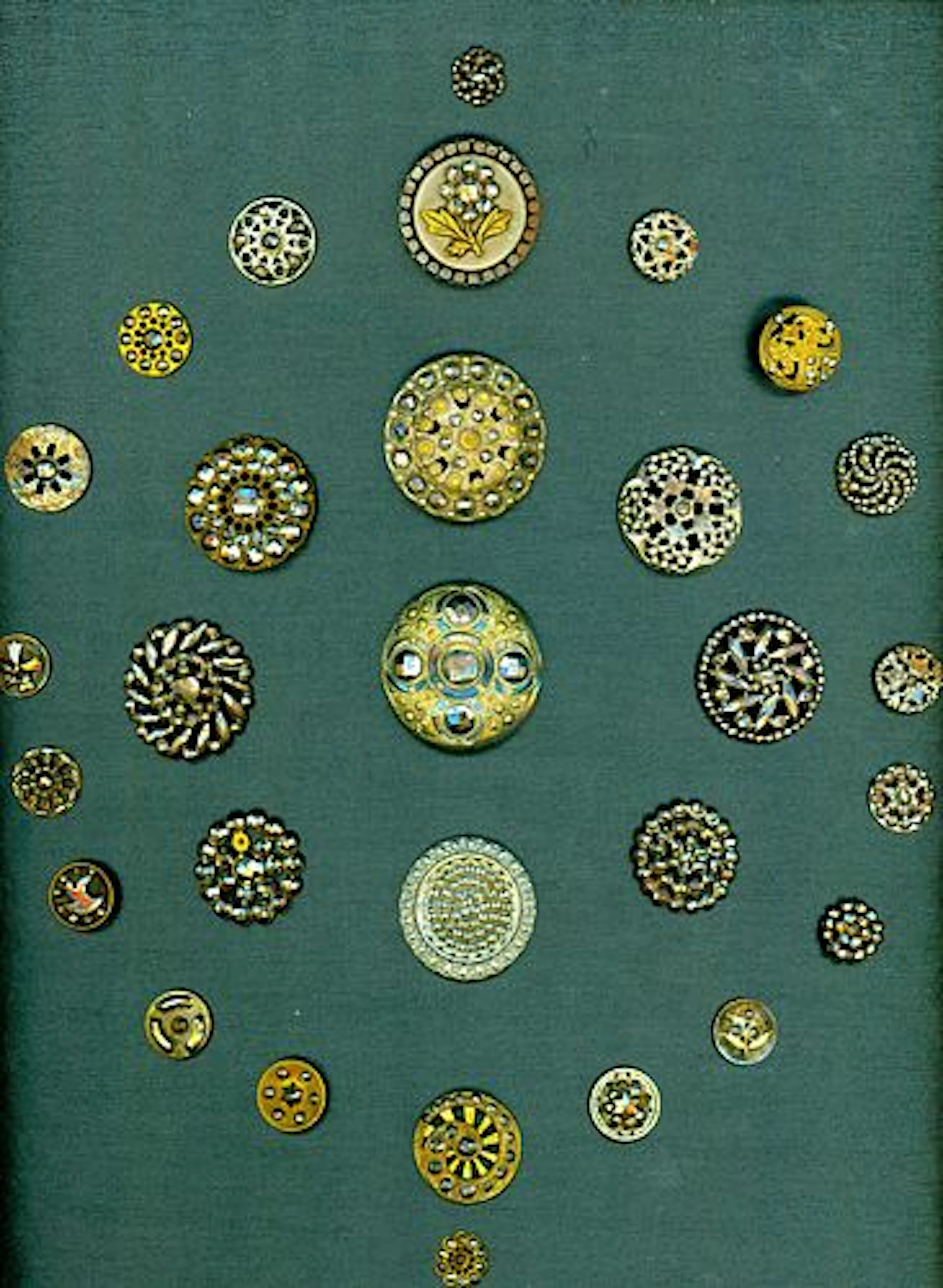 A CARD OF DIVISION ONE BRASS AND CUT STEEL BUTTONS