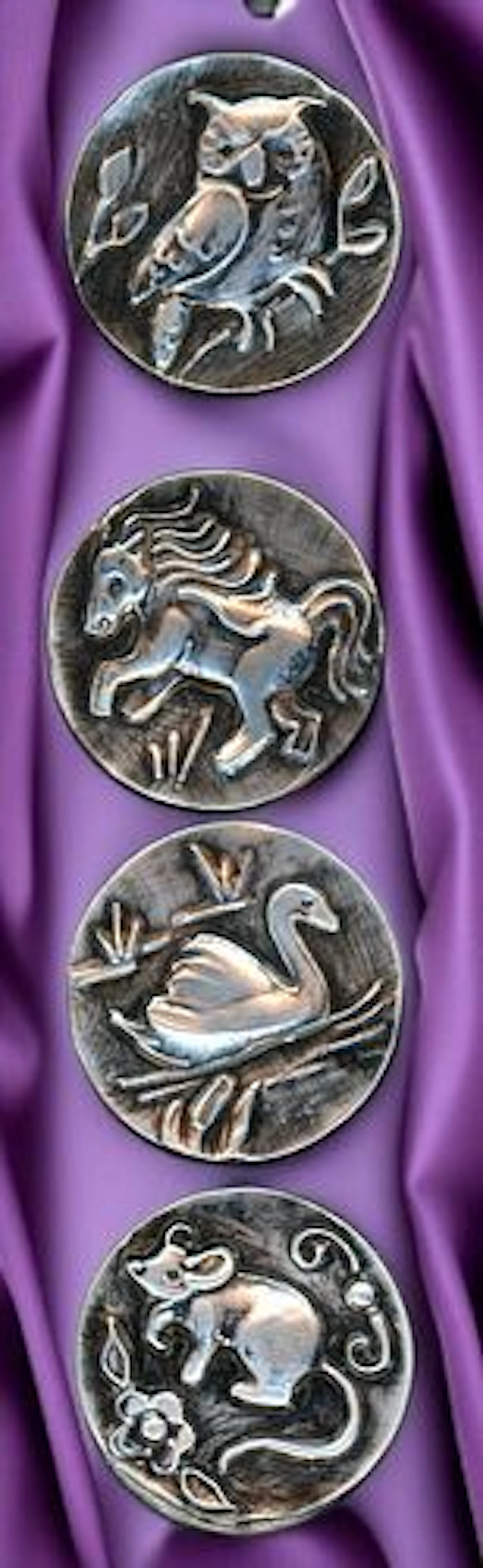 A SMALL CARD OF DIVISION THREE STUDIO ARTIST BUTTONS