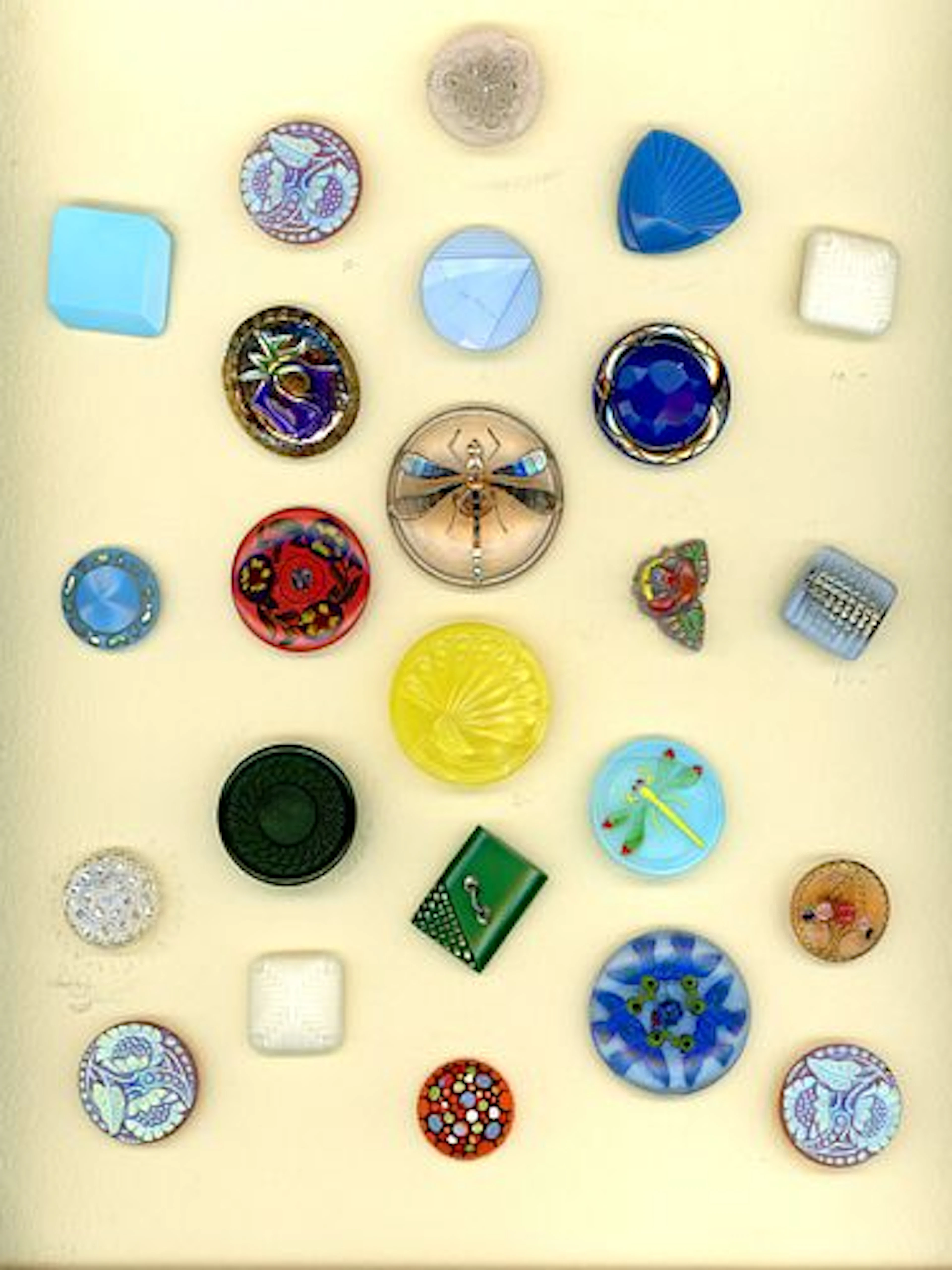 A CARD OF DIVISION THREE CZECH GLASS BUTTONS