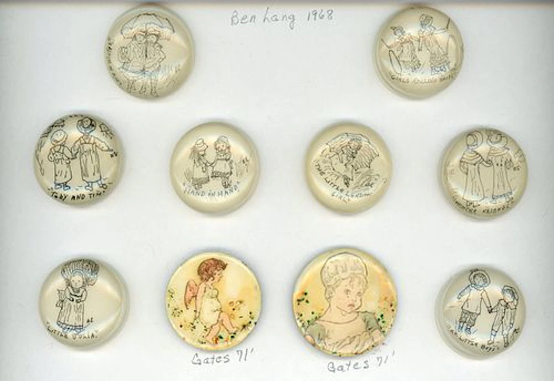 A SMALL CARD OF STUDIO ARTIST BUTTONS