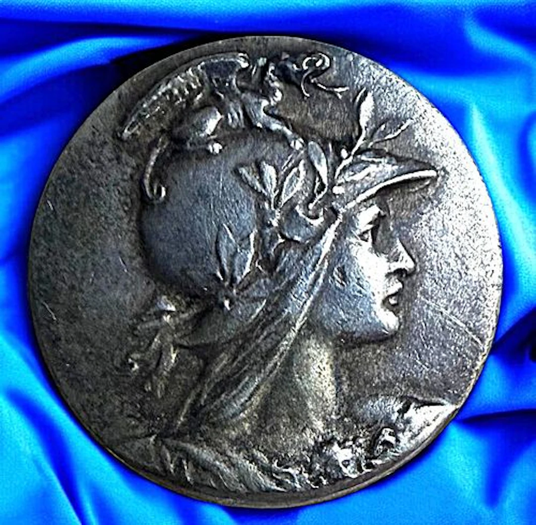 A DIVISION ONE THIRD AVENUE SILVER BUTTON