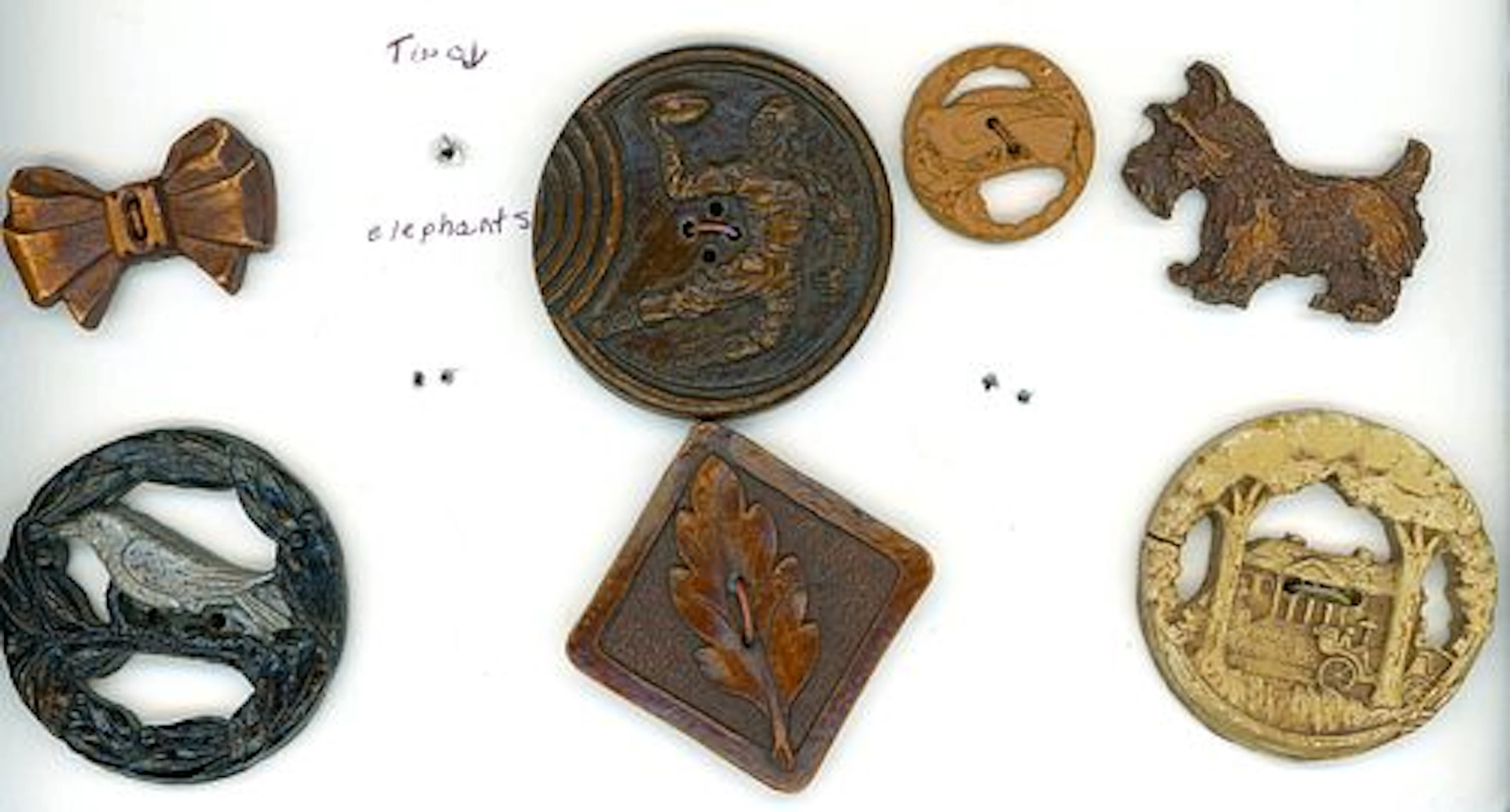 A PARTIAL CARD OF DIVISION THREE BURWOOD BUTTONS