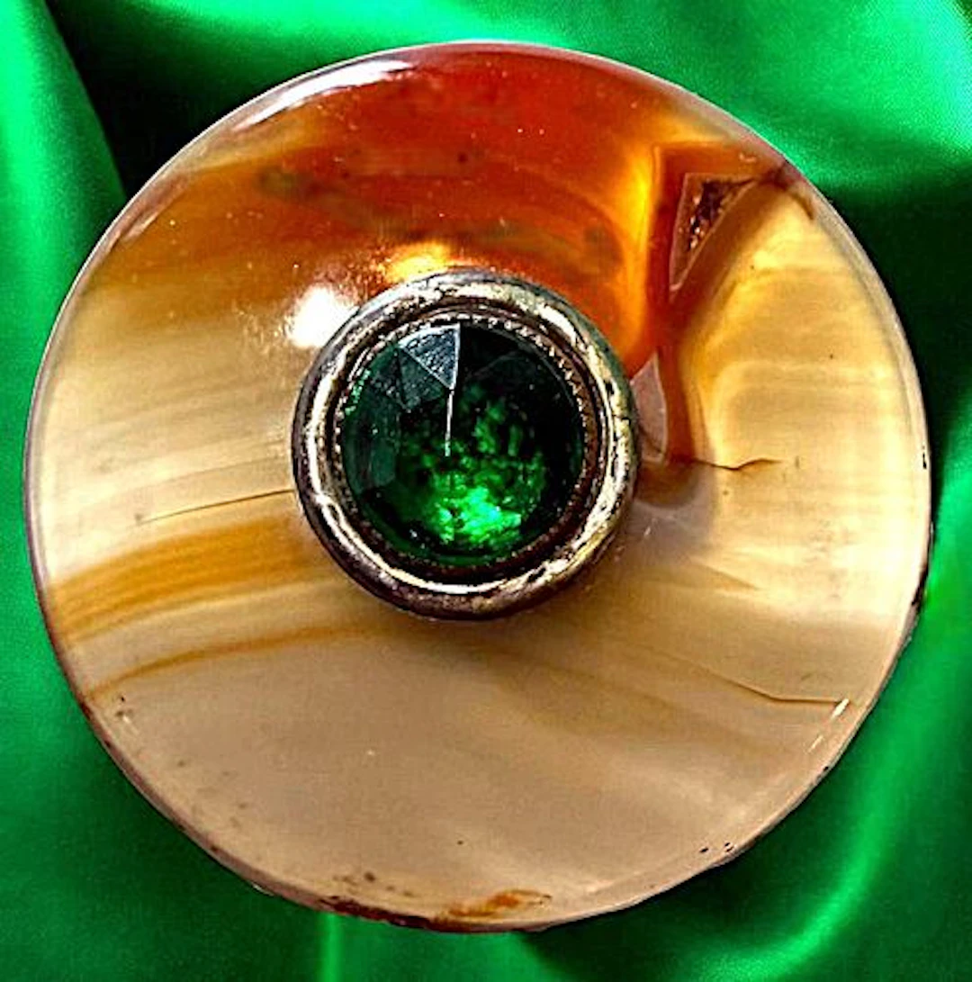 A DIVISION ONE JEWELED GEMSTONE BUTTON