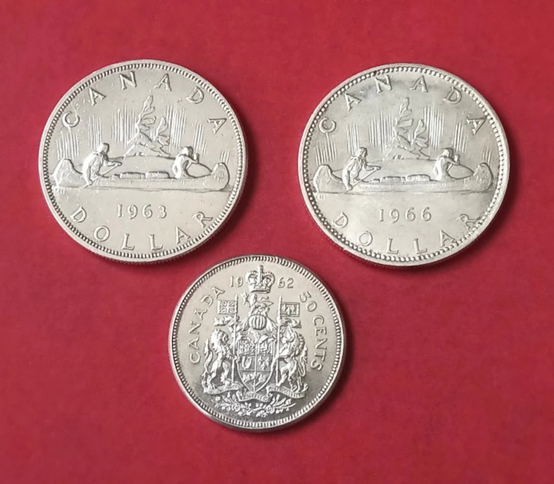 Canada. Dollar 1963 y 1964 + 1/2 Dollar 1962 (3 monedas) (No reserve price)