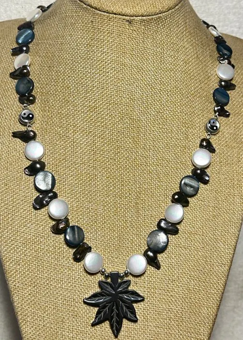 Natural Mother of Pearl and Cultured Black Pearls with...