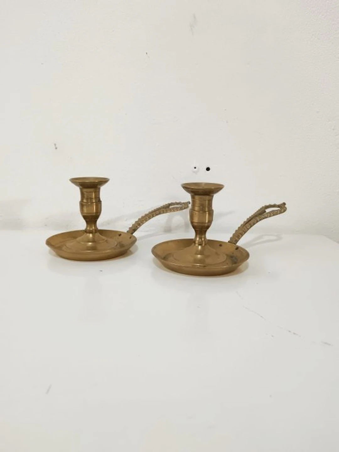 Candelabrum Pair of antique brass palmatorias / hand-held...
