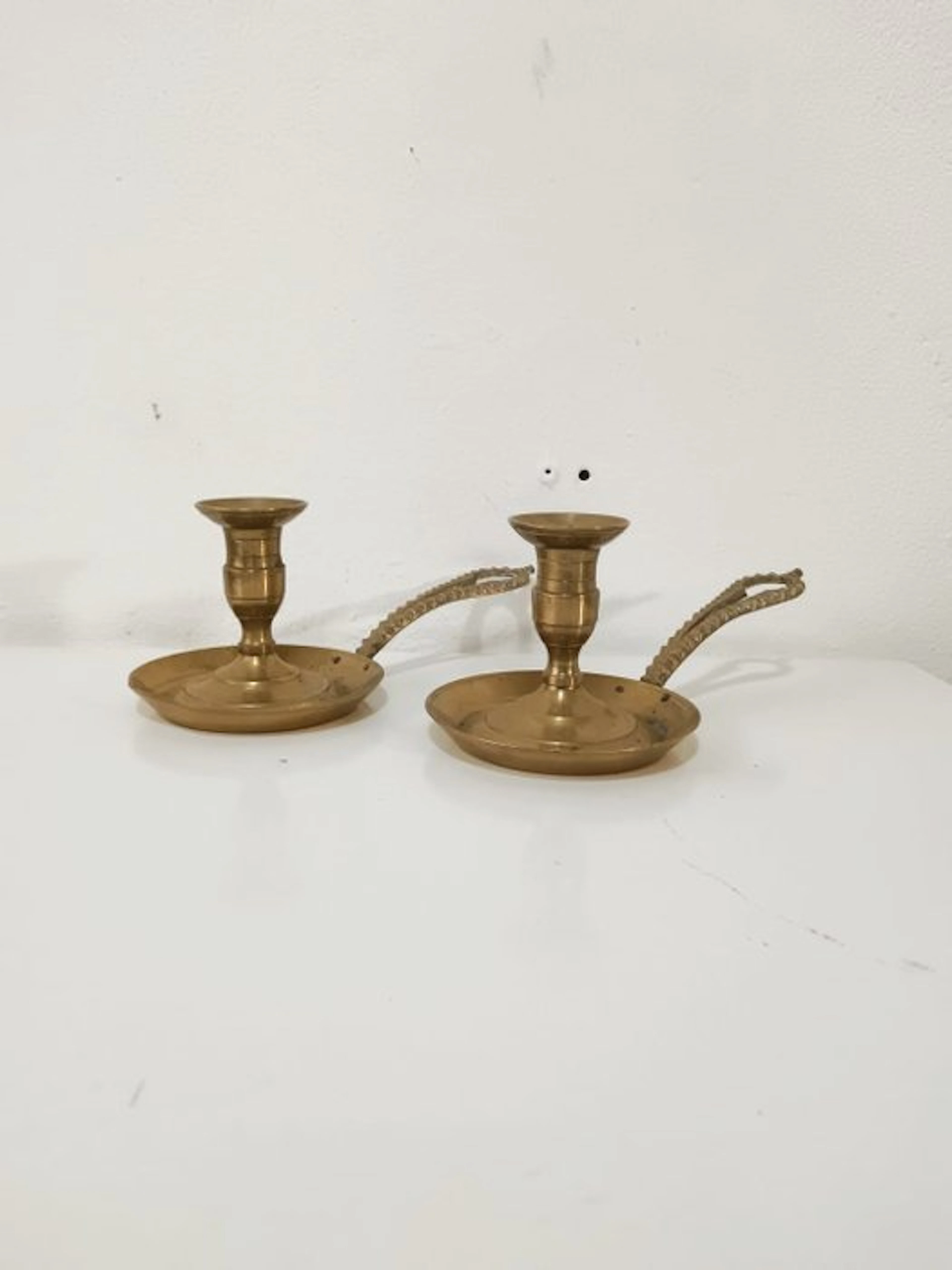 Candelabrum Pair of antique brass palmatorias / hand-held...