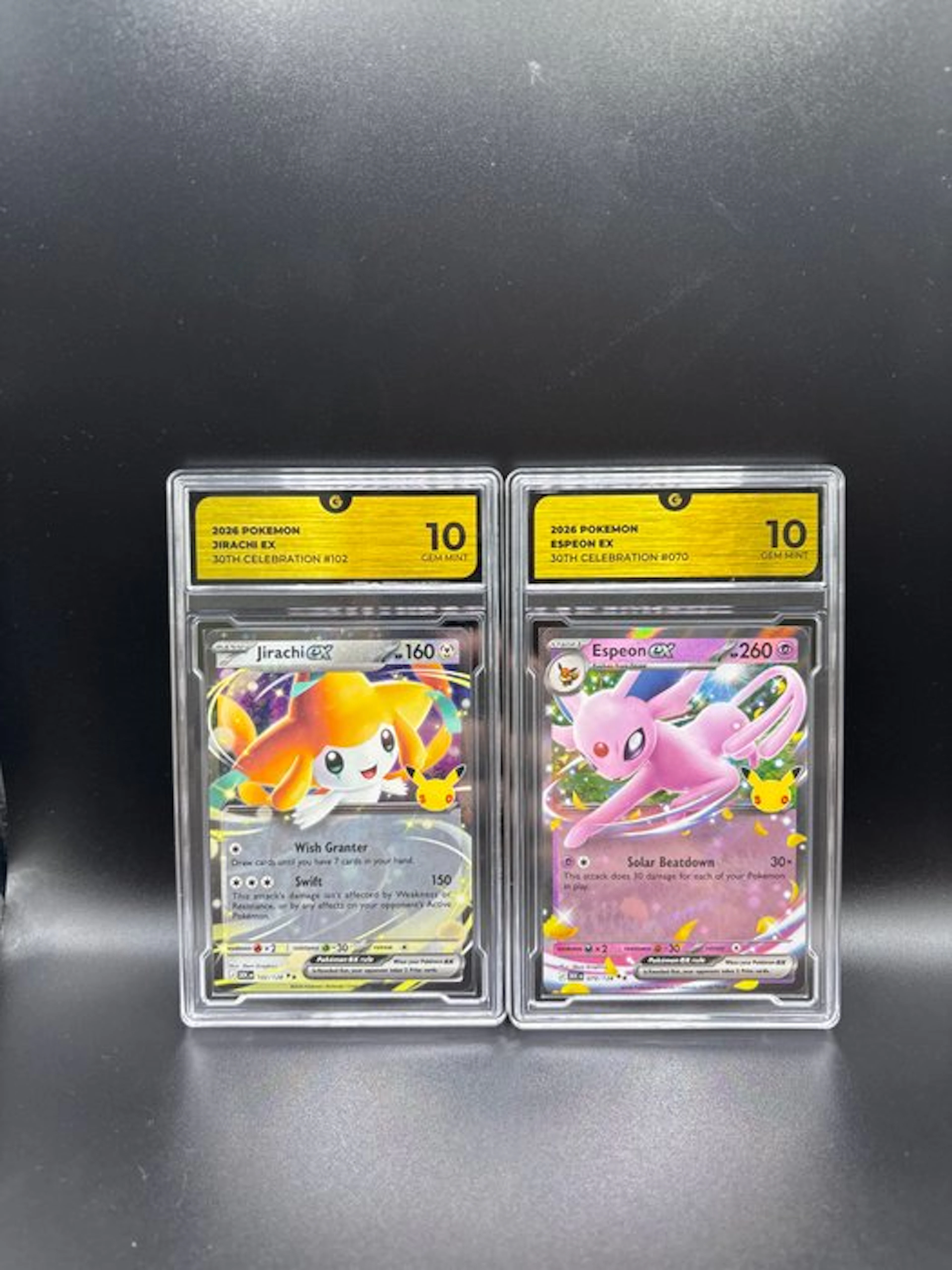 Pokémon - 2 Graded card - Espeon, Jirachi 30 TH Annivesary - GG 10