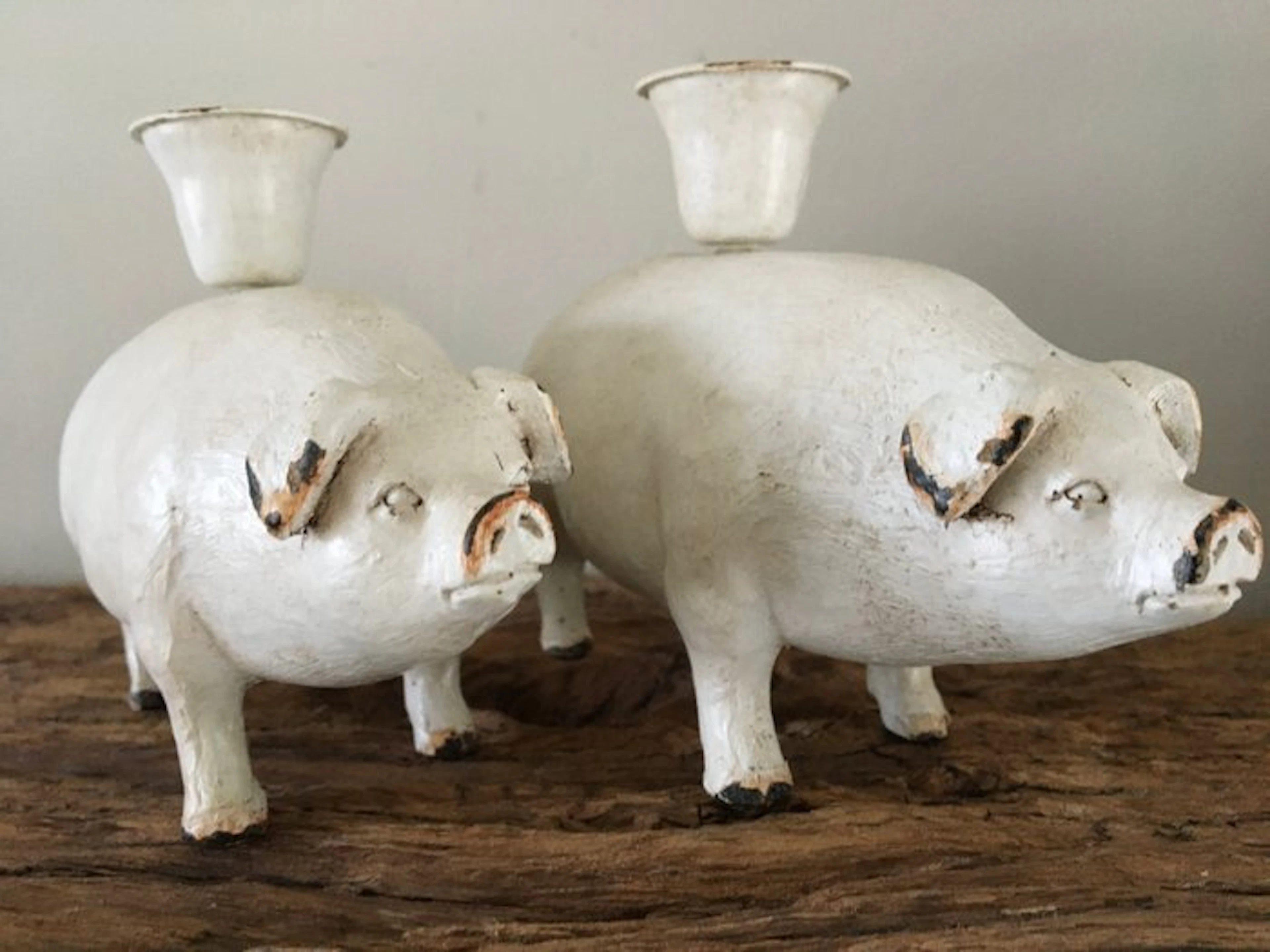Candleholder (2) - Iron, unknown - Set of pig candlesticks.