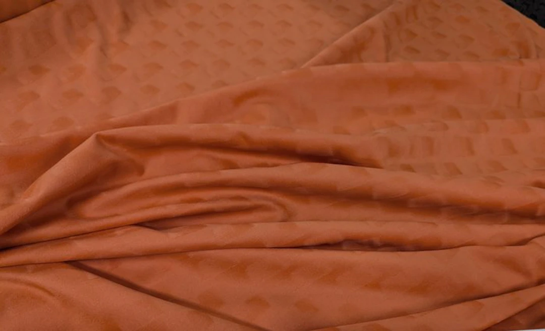 Copper Elegance – Vellutino Jacquard Tono su Tono...