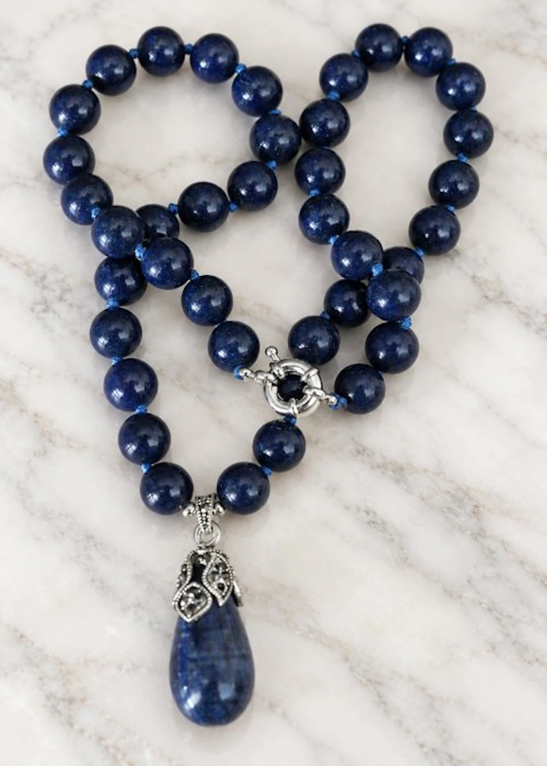 Necklace of natural Egyptian lapis-lazuli with a pendant...