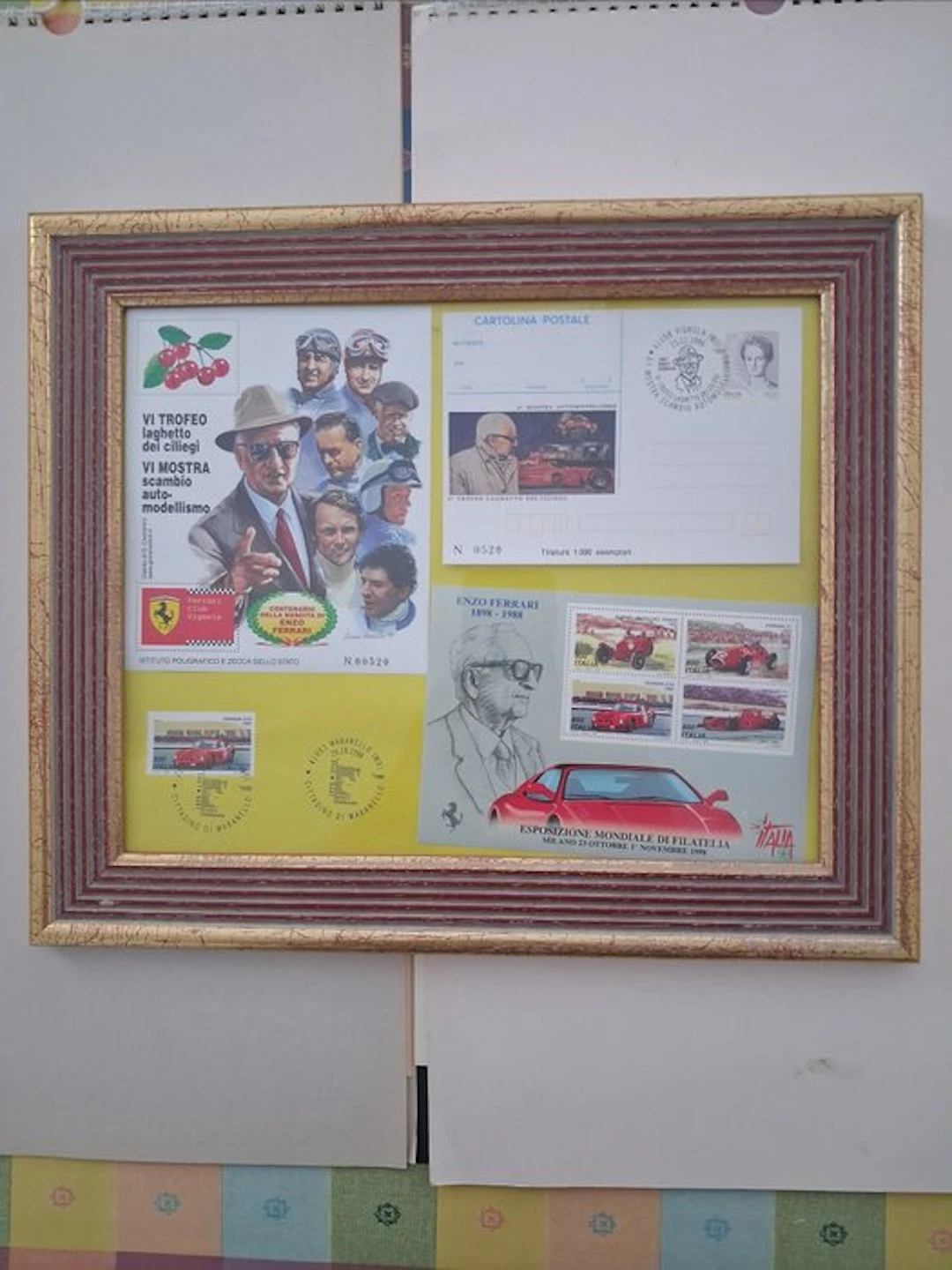 Framed piece featuring four different designs for the Enzo Ferrari centennial