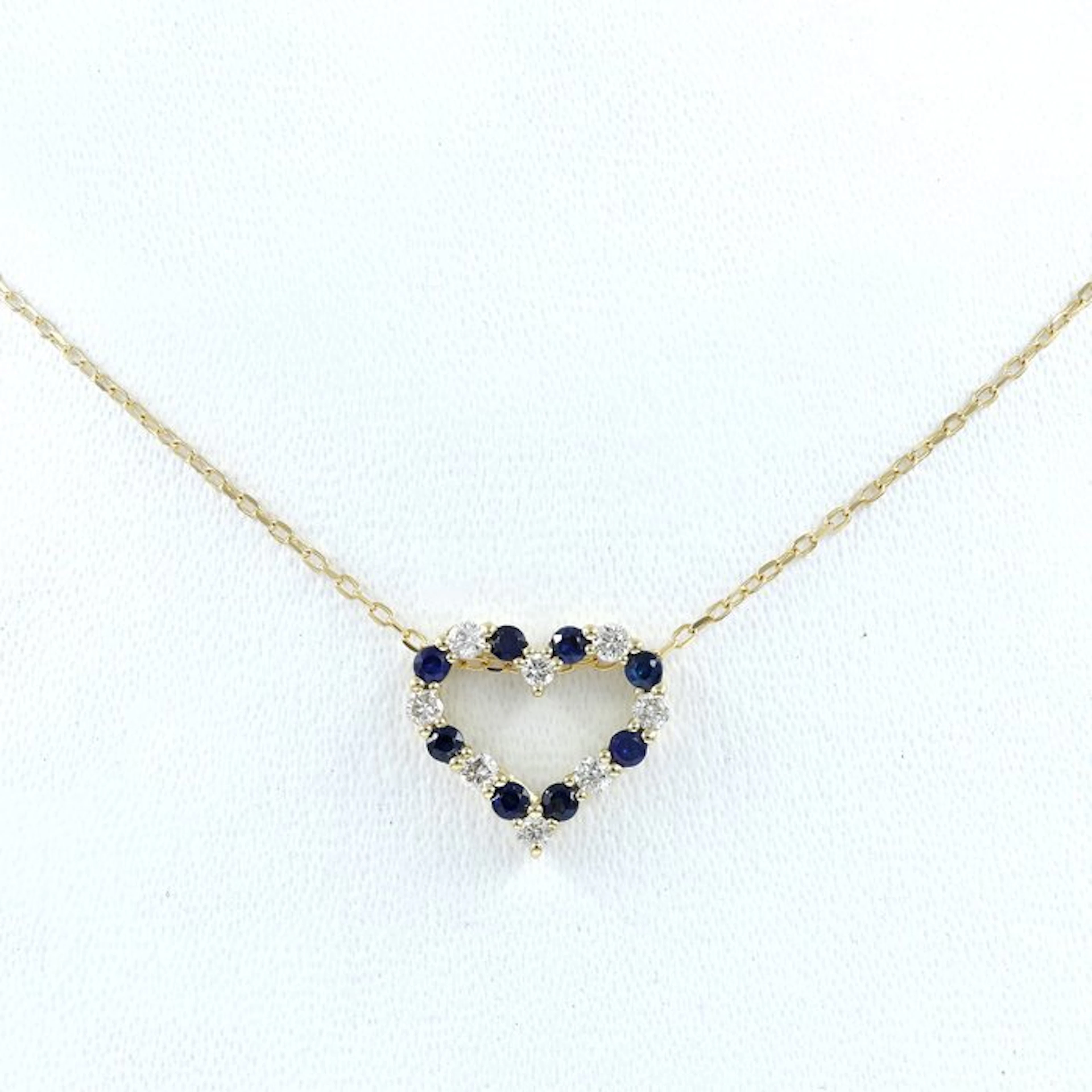 Necklace with pendant - 14 kt. Yellow gold - 0.61ct. tw. Sapphire - Diamond