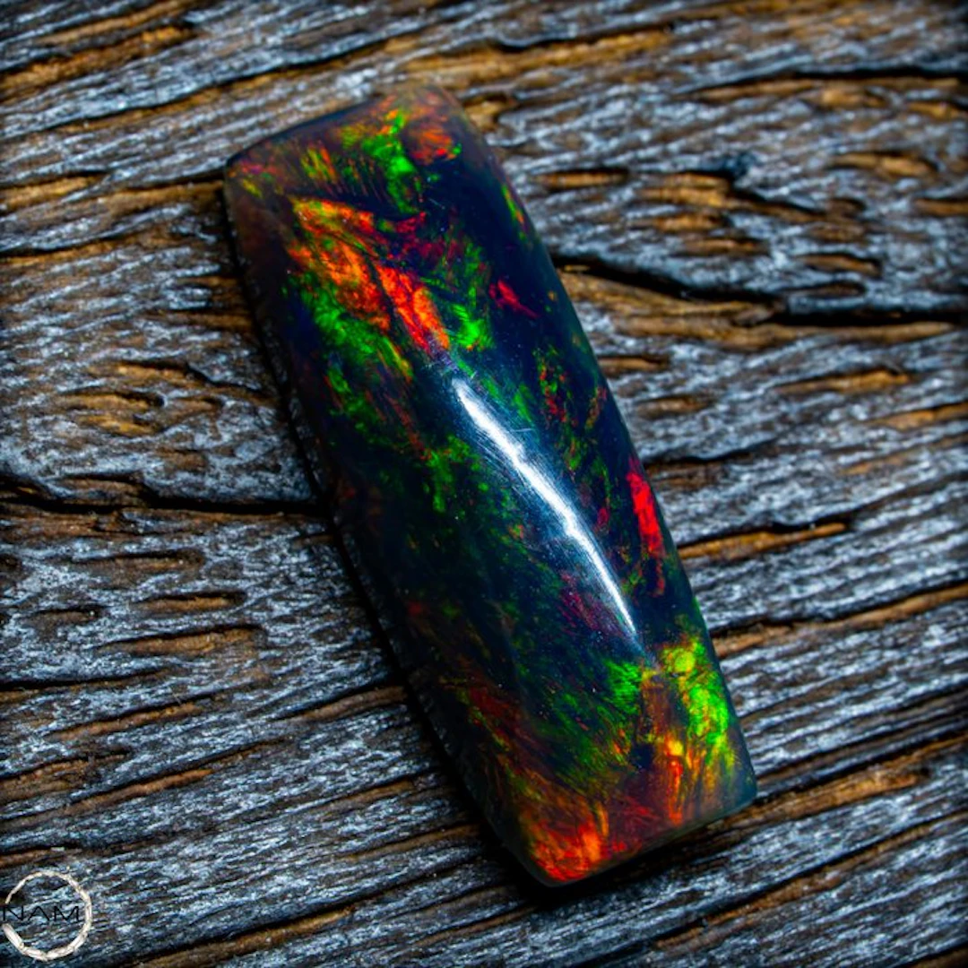 The finest Black Opal in glowing rainbow colors—a...