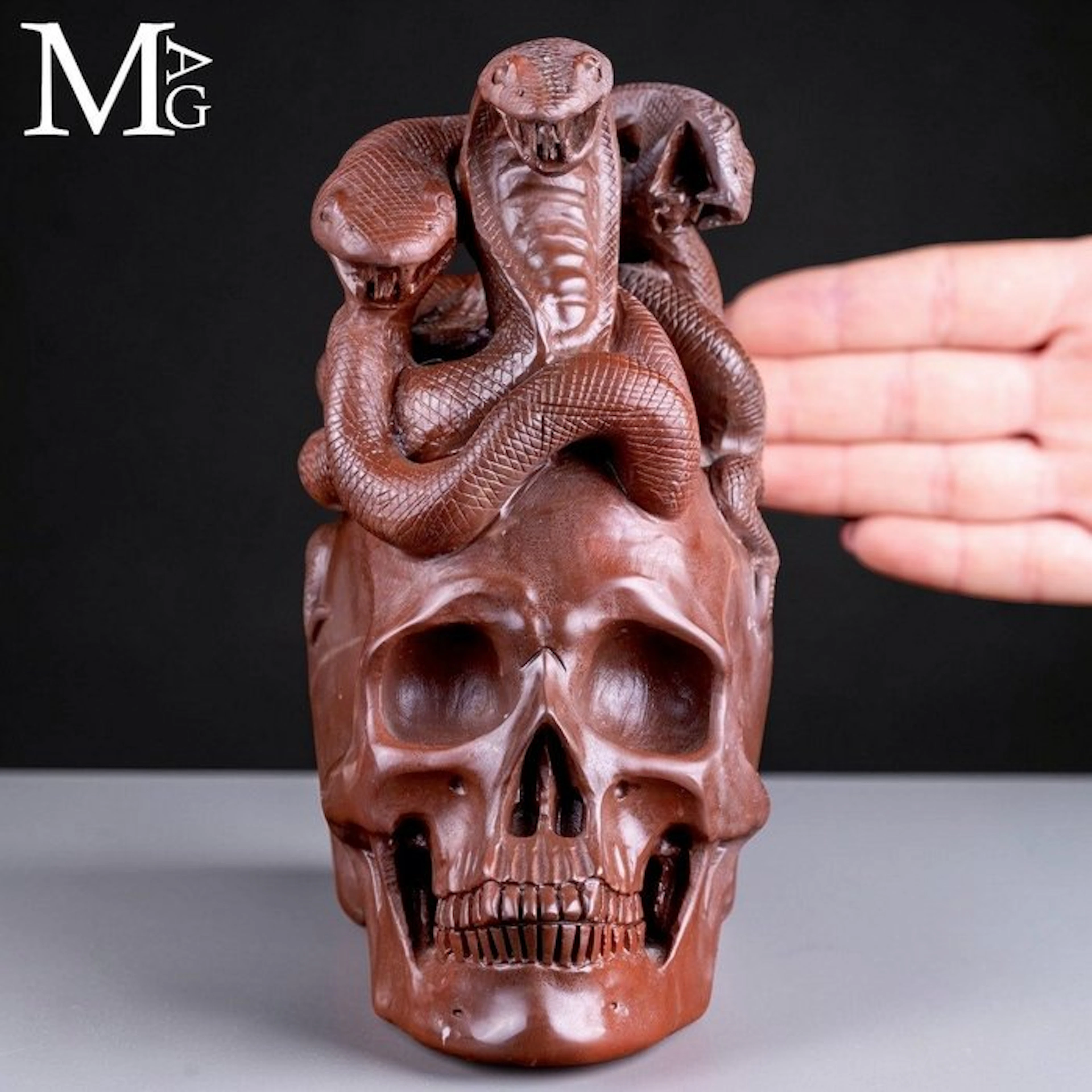 Intricately carved high-grade Brown Jasper Skull...