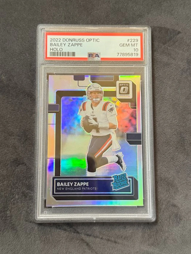 2022 Donruss Donruss Optic Bailey Zappe 229 Holográfica - PSA 10 -
