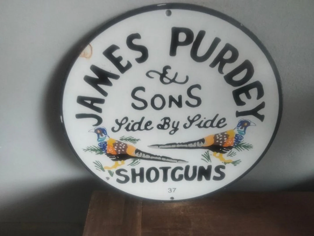 United States - Enamel advertising sign for Purdey...