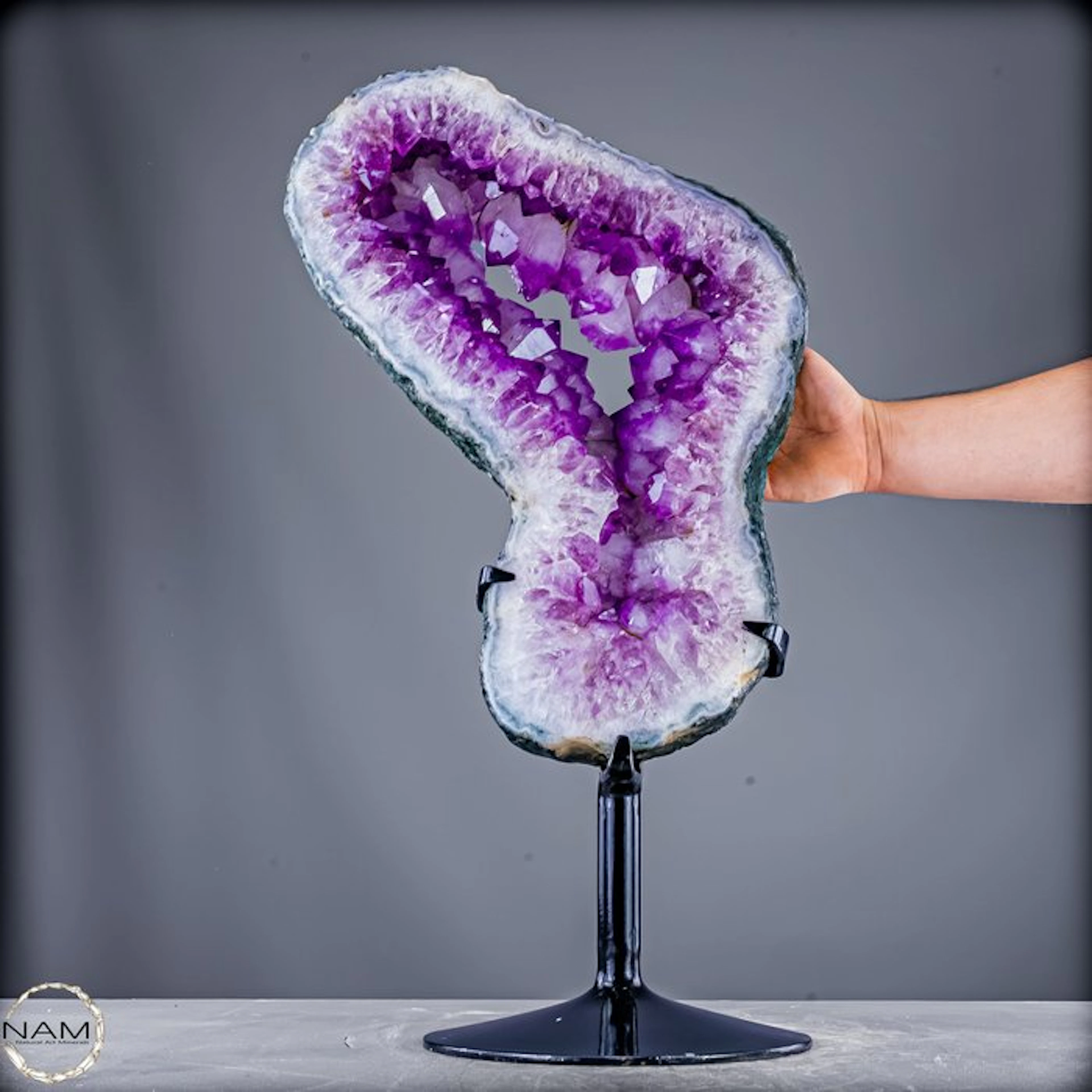 Exclusive amethyst disc on an elegant metal stand with sparkling crystal druzy