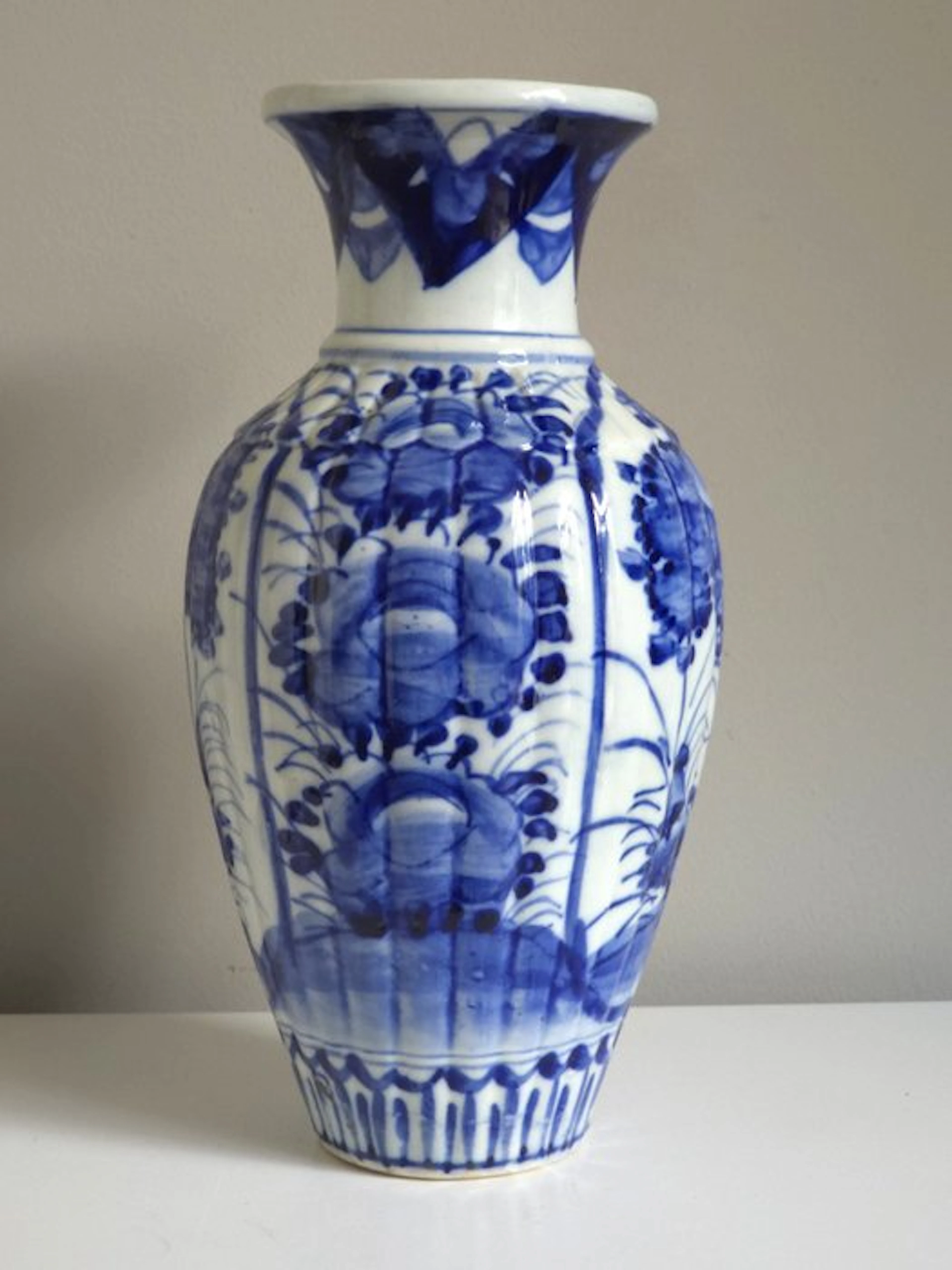 Antique Japanese Arita porcelain ribbed baluster vase...