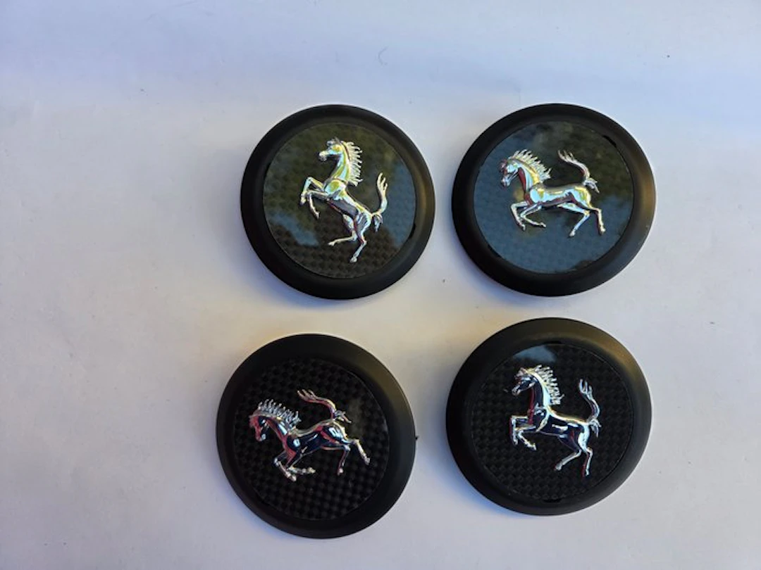 Car part - Ferrari - n.4 HUBCAP wheels Coppette ruota...