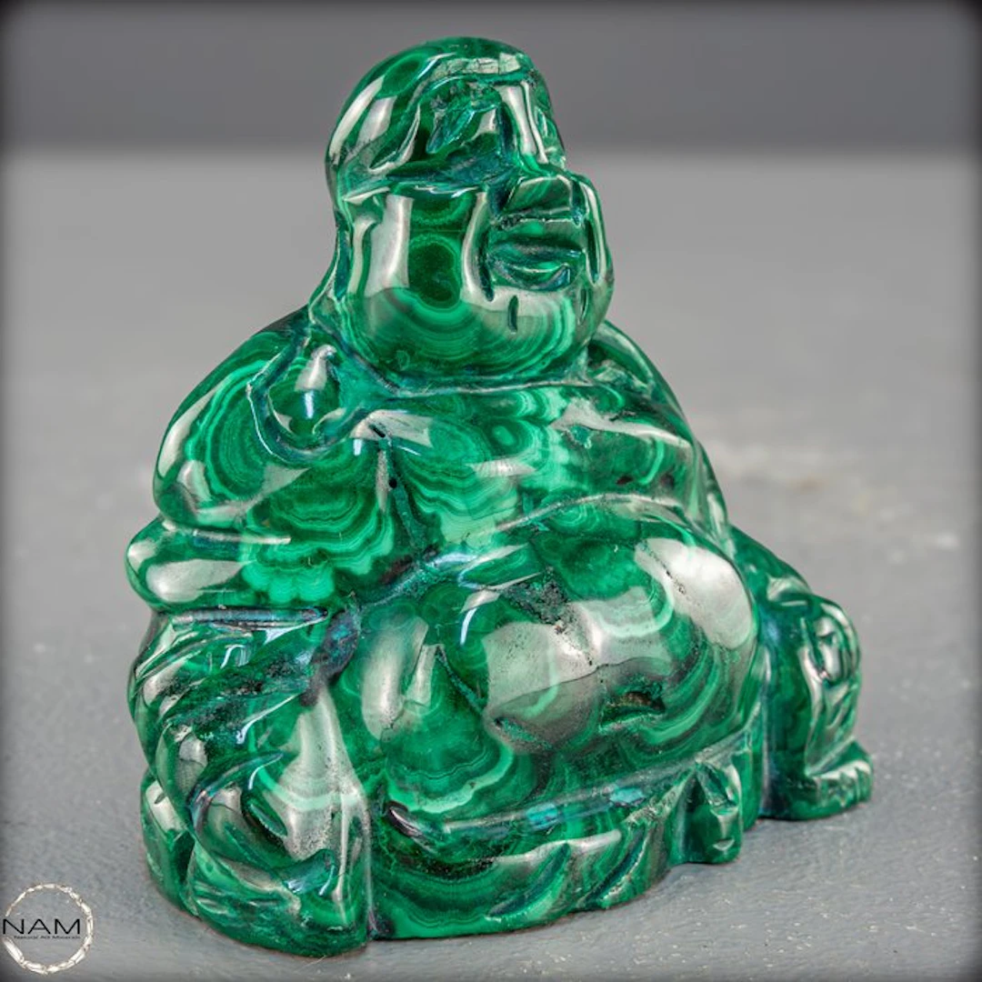 Natural malachite Buddha – Symbol for abundance