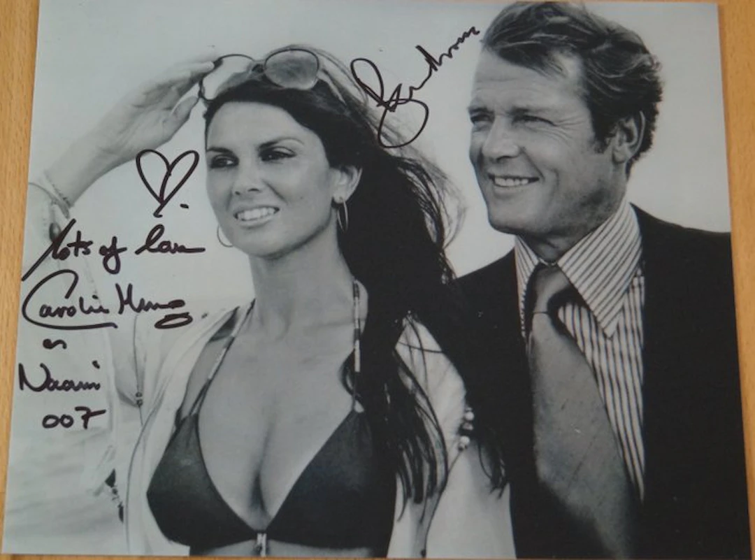 James Bond 007: The Spy Who Loved Me - Roger Moore (+) as 007 with Caroline Munro double signed - signed photo with bbc holographic COA