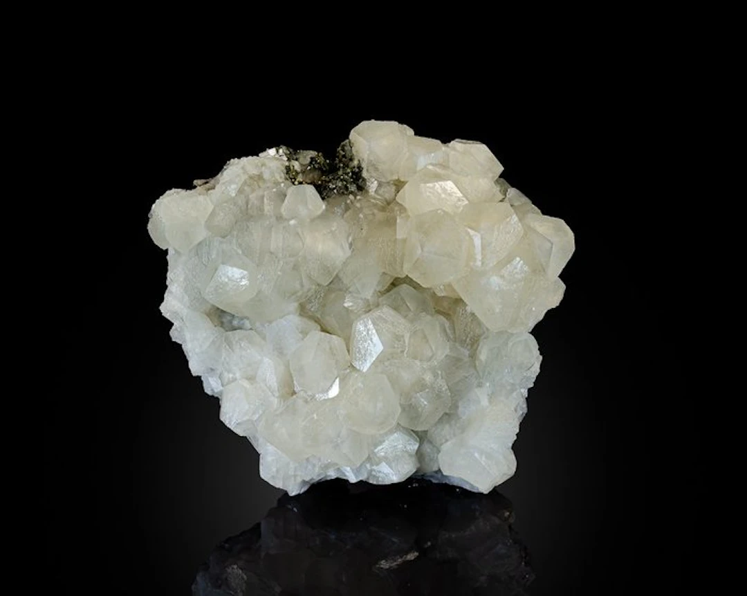 Gemmy translucent rhombic Calcite on a black contrasting...